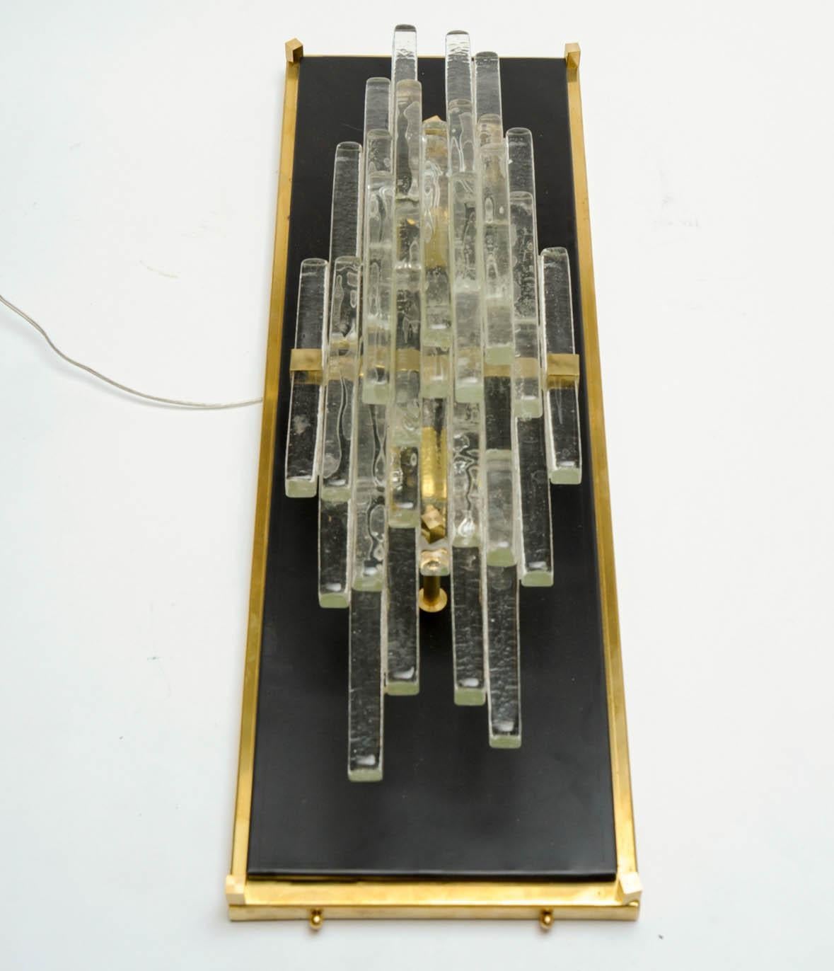 Mid-Century Modern Sculptural Murano Glass Sconces at cost price. For Sale