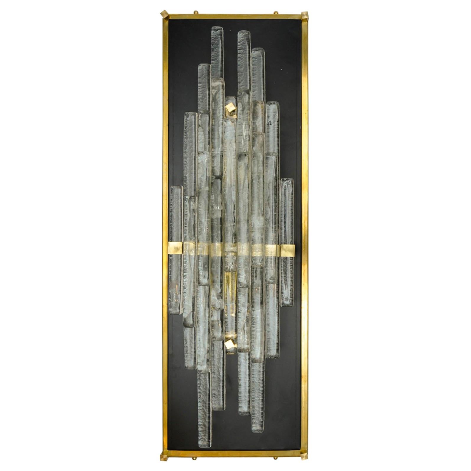 Sculptural Murano Glass Sconces at cost price.