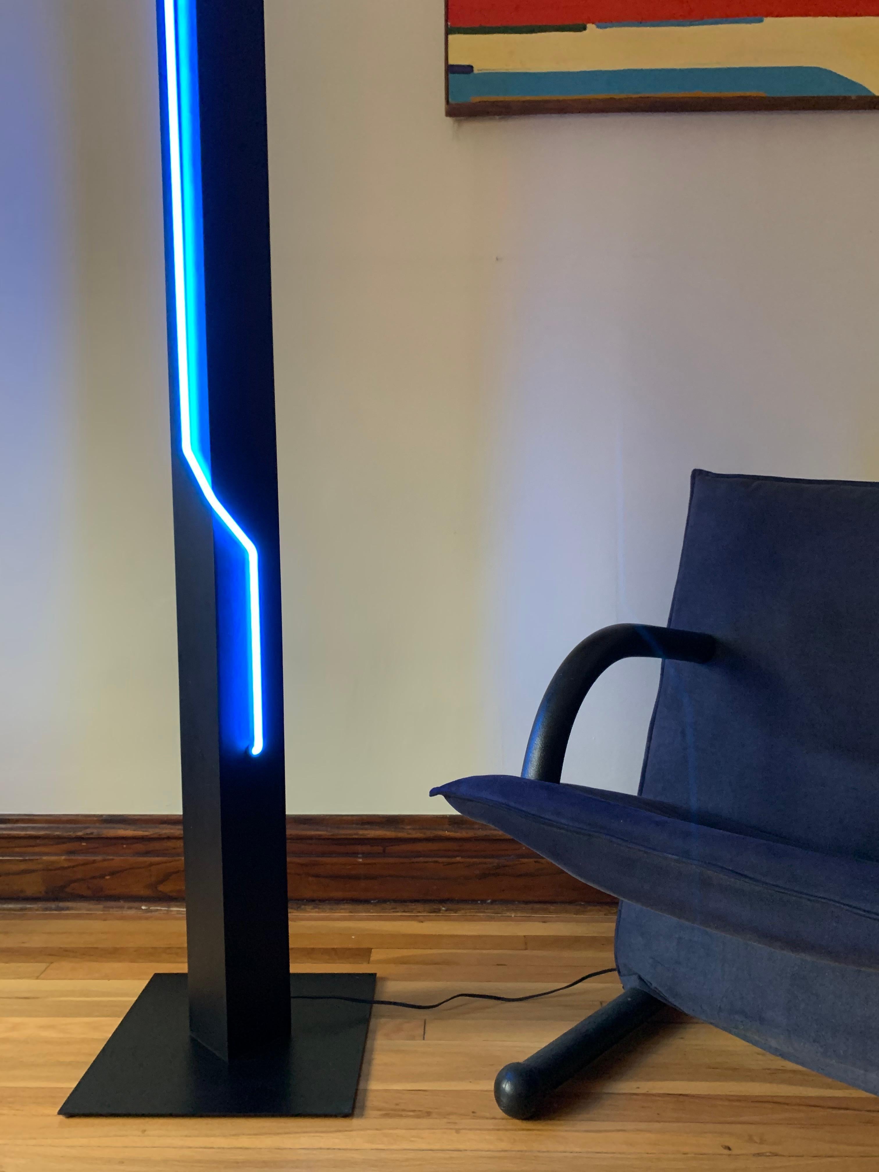 A true statement. Sculptural, monolithic halogen torchiere with a blue neon element designed by Dan Chelsea of Let There Be Neon, founded by Rudi Stern, in collaboration with George Kovacs. A total must have for any fan of the eclectic and