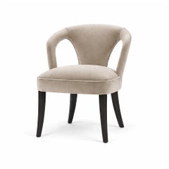 Sculptural Open-Back Dining Chair with Curved Arms and Tailored Upholstery
