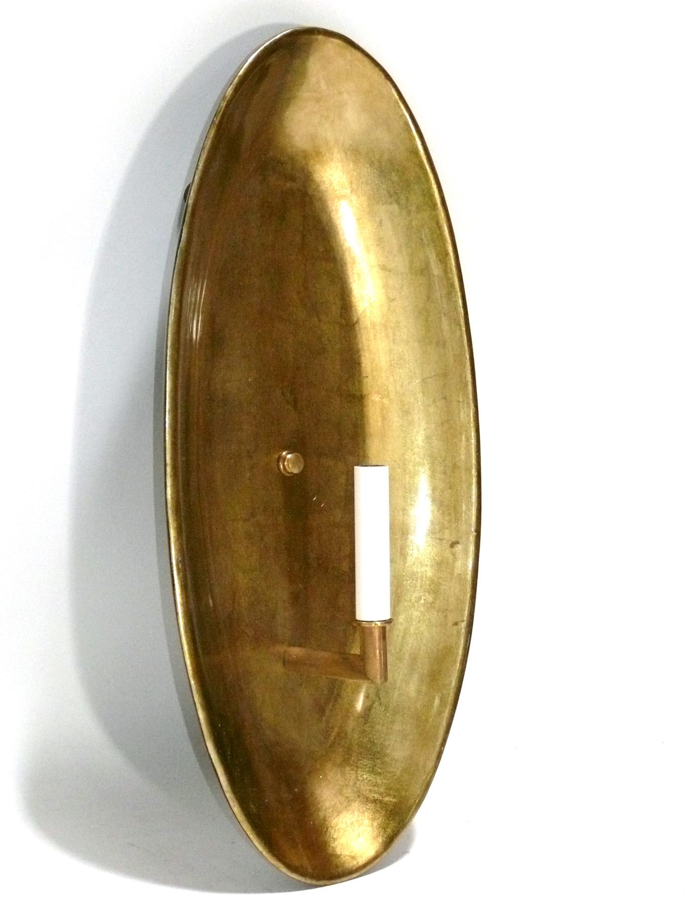 Sculptural gilt wood sconce, in the manner of Herve van der Straeten, Italy, circa 1960s. It has been rewired and is ready to use. We only have a single sconce.