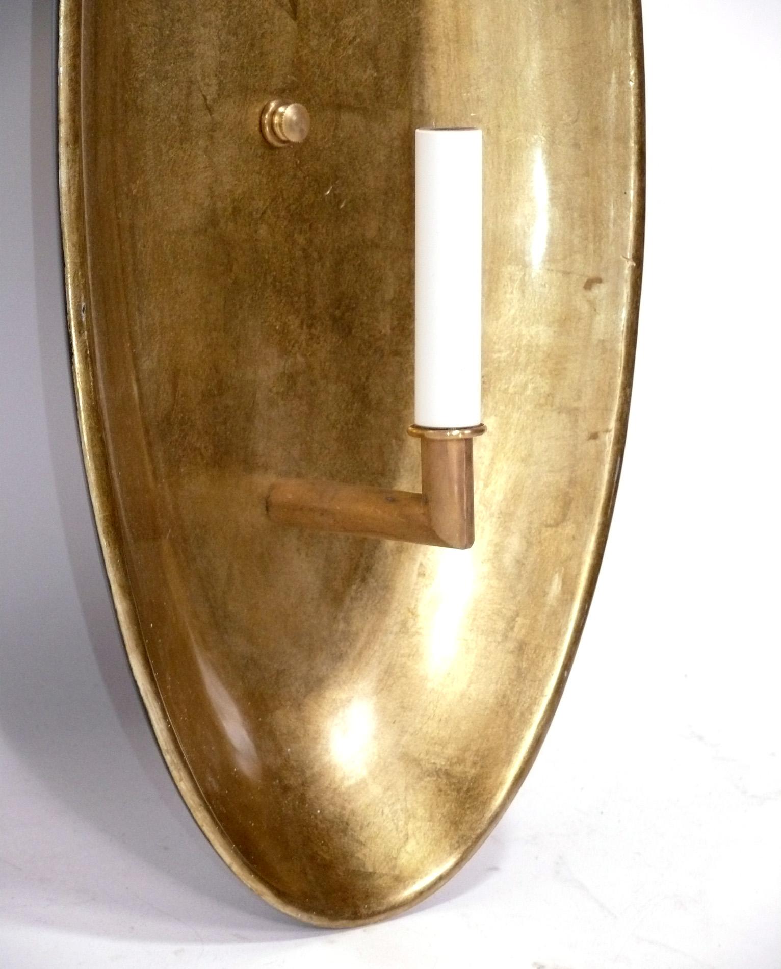 Gilt Sculptural Oval giltwood Sconce For Sale