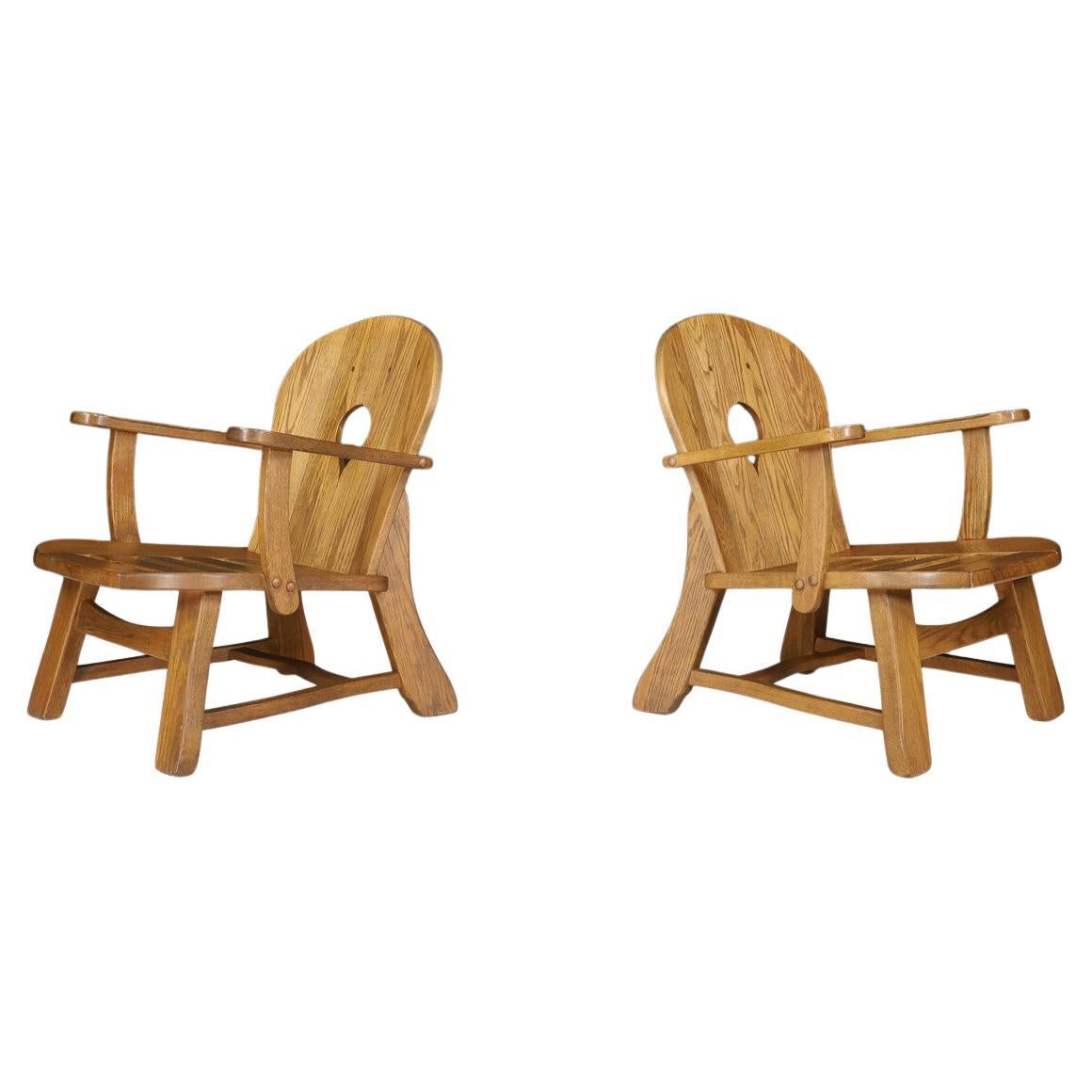 Sculptural Pair of French Brutalist Oak Lounge Chairs, 1960s