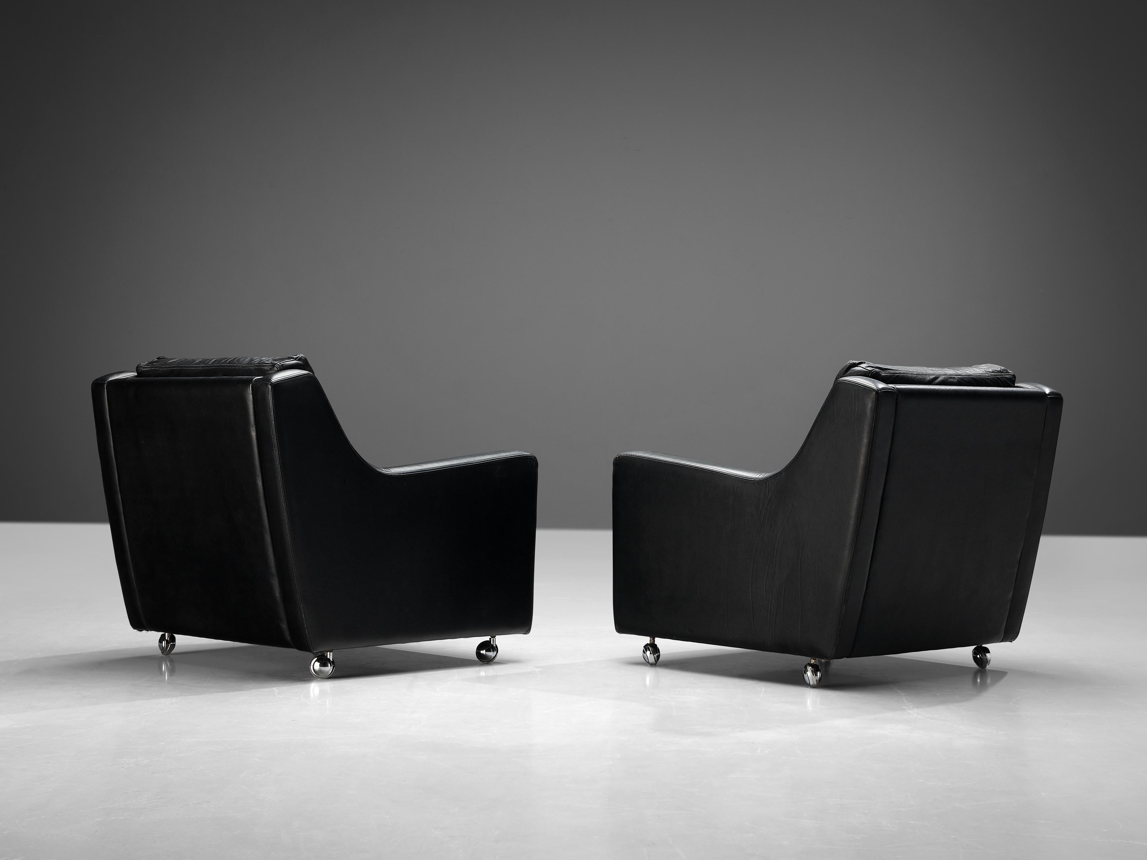 European Sculptural Pair of Lounge Chairs in Black Leather For Sale