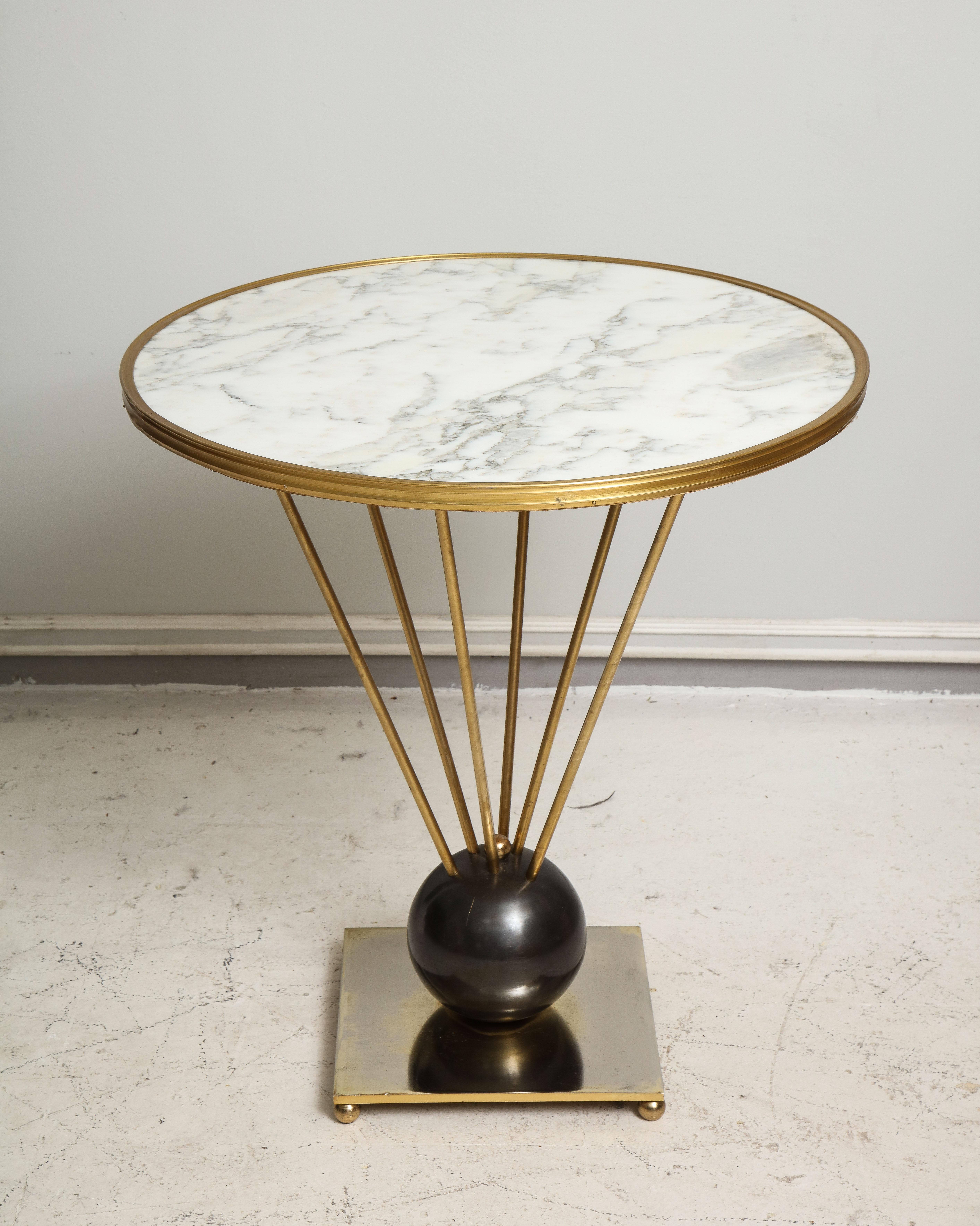 Sculptural pair of bronze and iron Italian Mid-Century Modern circular tables with marble top.