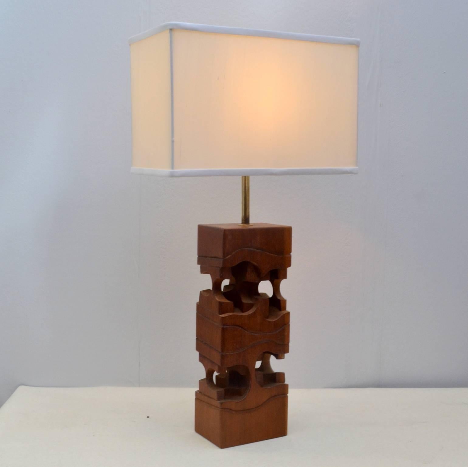 Sculptural hand carved in lamps teakwood. The new shades are silk double lined.
Brian Willsher began working with wood in 1956, applying his experimental forms to lamp bases. Shortly afterwards Christopher Heal, of department store Heal’s, asked