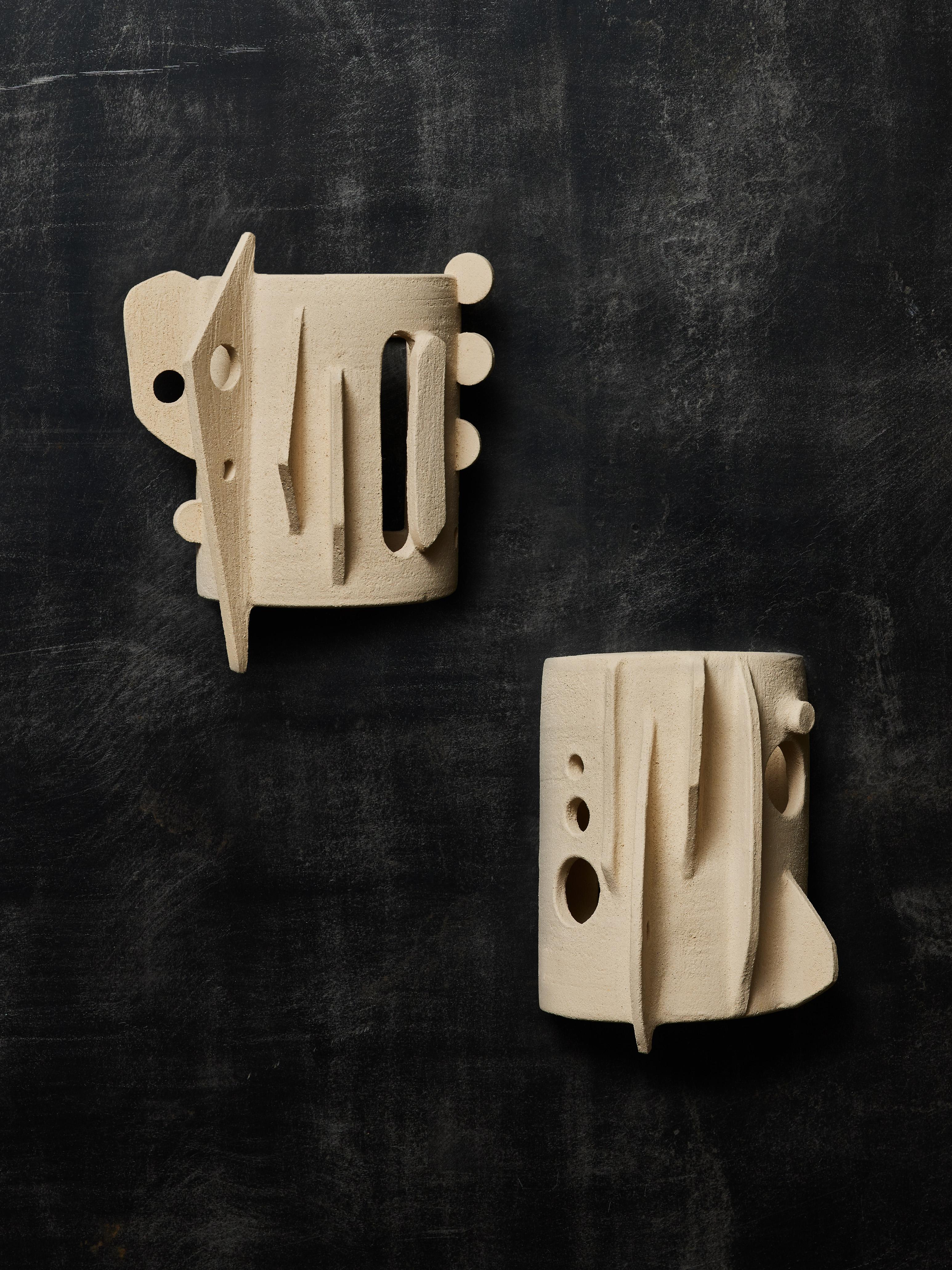 Sculptural pair of wall sconses by Olivia Cognet in ceramic 


Since moving to Los Angeles in 2016, French artist and desi- gner Olivia Cognet has focused on ceramics as the fertile medium through which she expresses her boundless creativity.