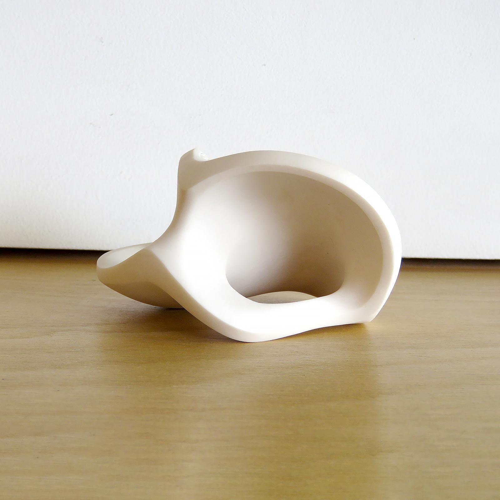 stunning palm stone B, handcrafted by Los Angeles based ceramicist Jed Farlow. A one-of-a-kind unglazed porcelain sculpture, part of an ongoing 'Bone' series. Each of these unique pieces is meticulously crafted and meant to be hand held, touched and