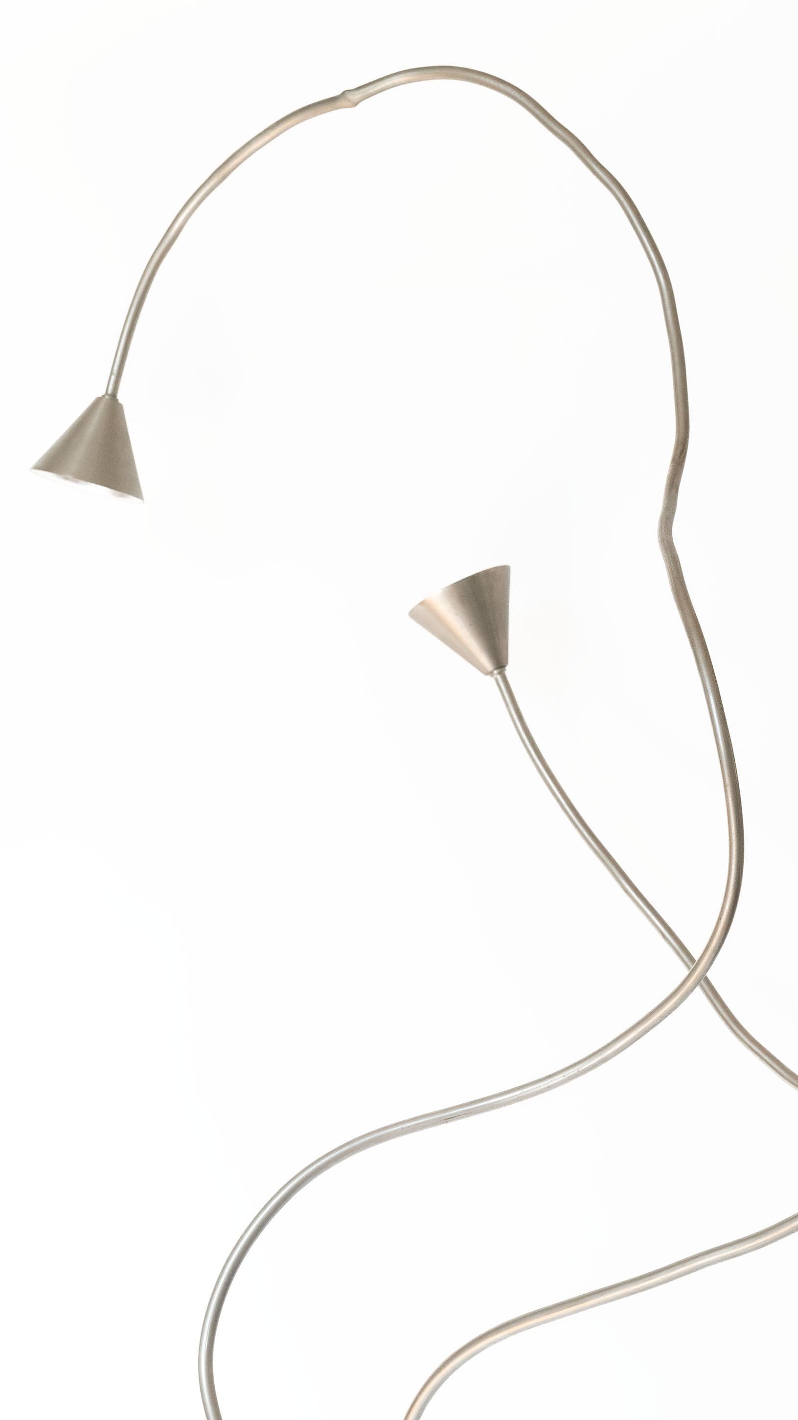 PAPIRO LAMPSSERGIO CALATRONI FOR PALLUCCO C.1989An interactive and sculptural design, each lamp can be bent into a variety of shapes and directions. Dimmer allows for the bulb to emit a soft light or a strong glow depending on the mood. 

color: