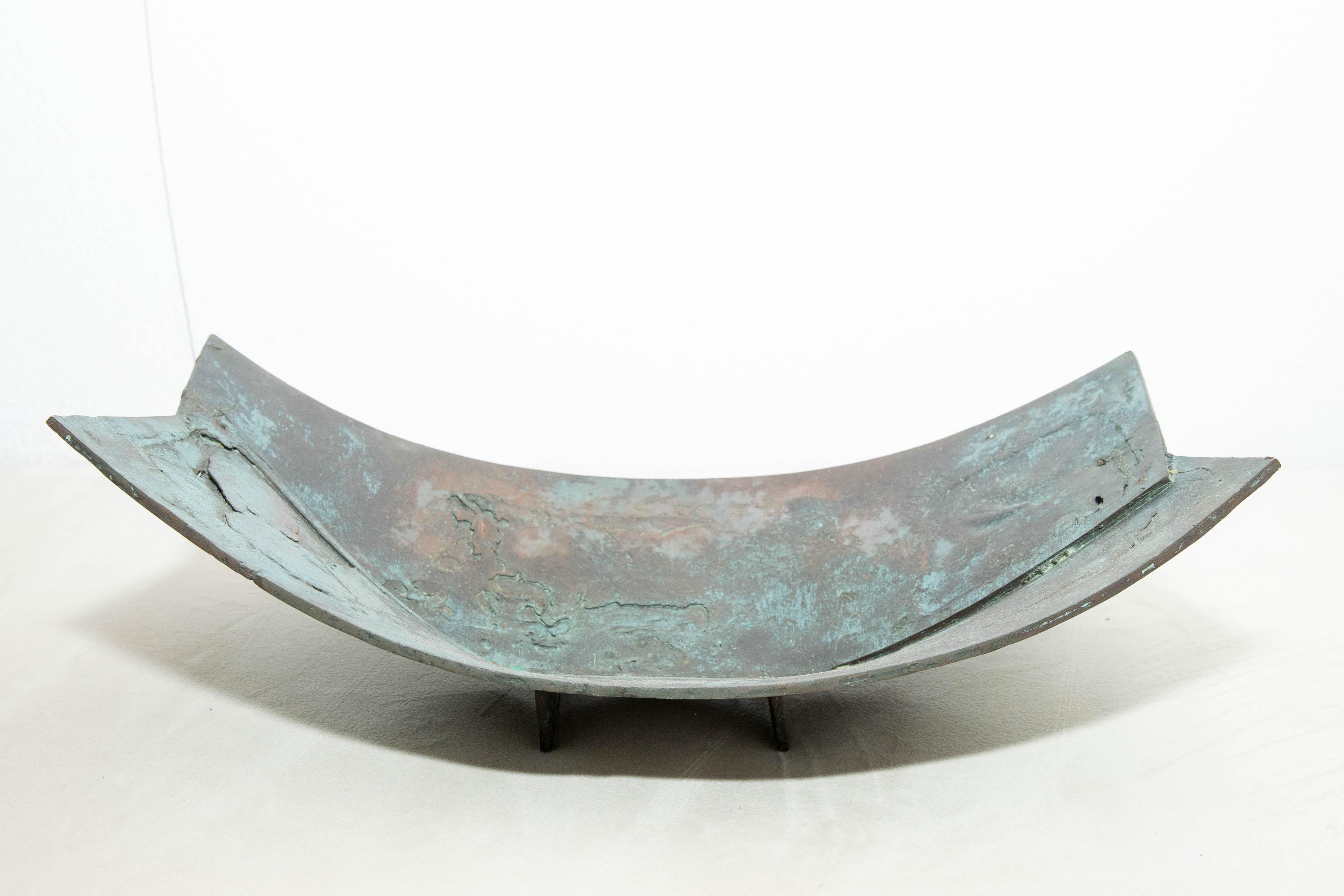 Sculptural patinated iron bowl.
 