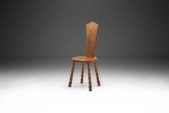 Sculptural Patinated Oak Spinning Chair, Europe ca early 20th century