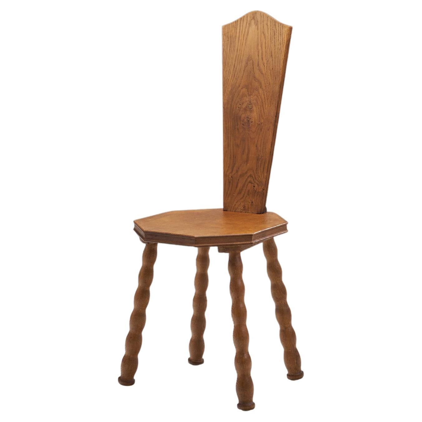 Sculptural Patinated Oak Spinning Chair, Europe Ca Early 20th Century For Sale