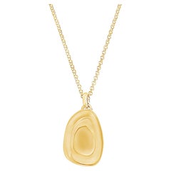 Medaglione scultoreo in oro vermeil 18 ct.