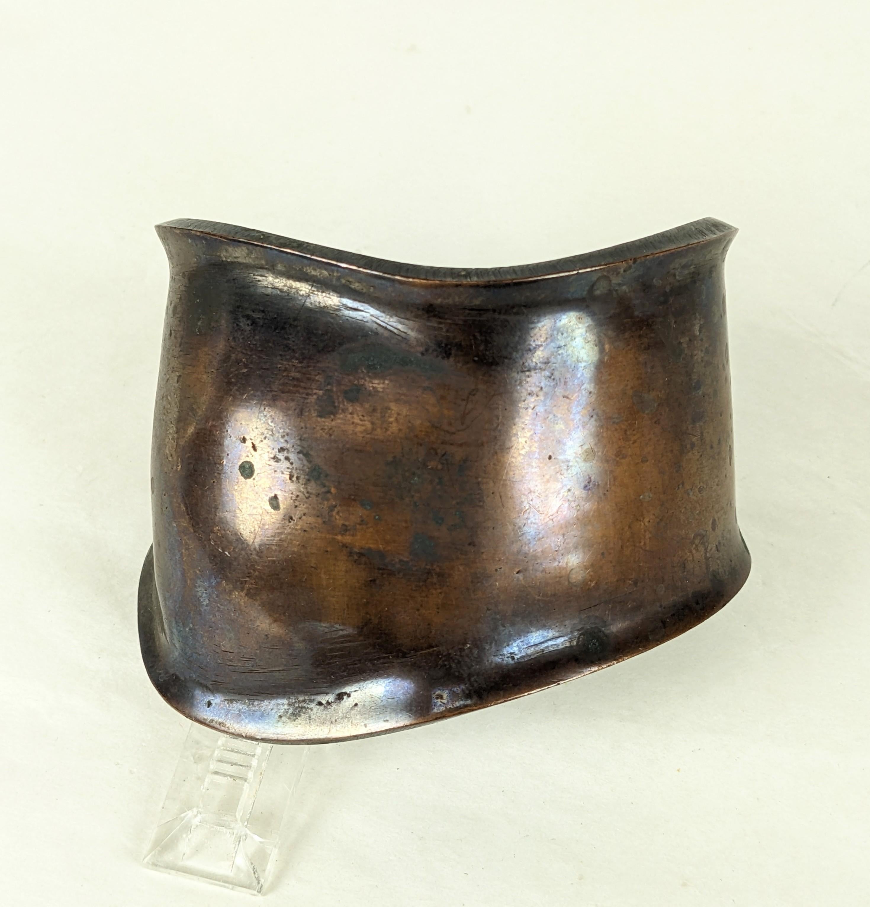Sculptural Peretti Style Copper Bone Cuff from the 1980's. Heavy Patinaed copper formed in the classic style created by Elsa Peretti. Widest 2.25. Interior measure 6