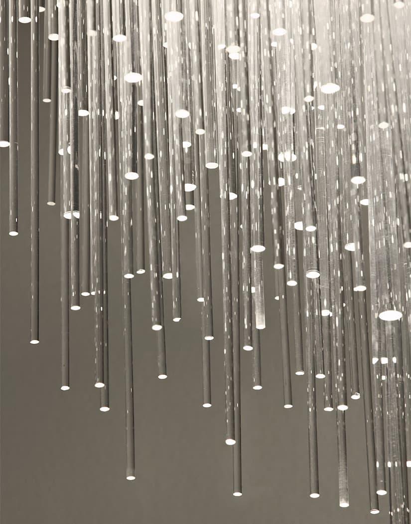 Inspired by the natural beauty of ice crystals, this new suspension light creates a spectacular, luminous piece through the use of over 3,600 Plexiglass tubes. Similar to light refracting through water, the illumination created by Iceberg is both