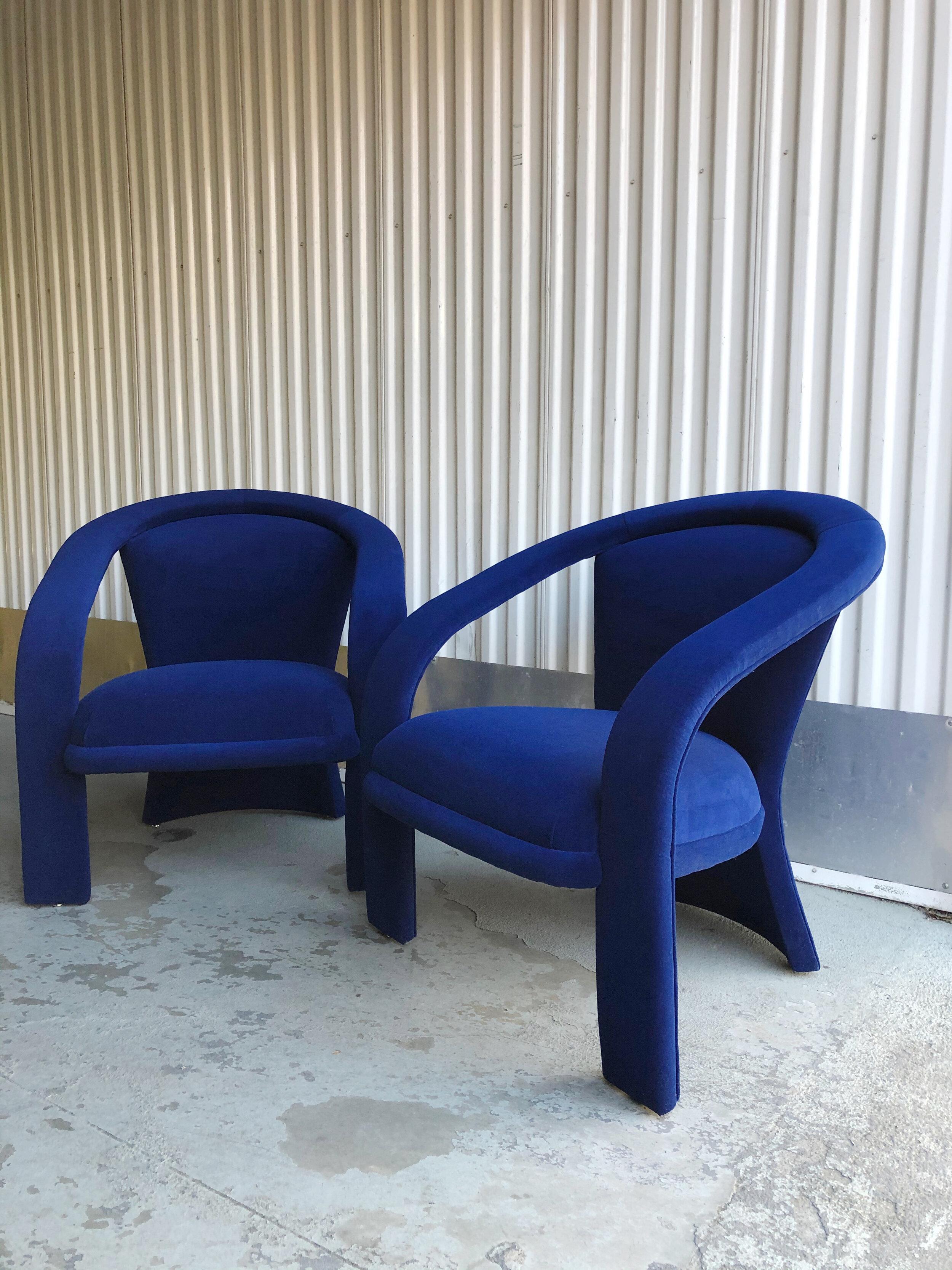 Sculptural post modern armchairs in indigo cotton velvet, in the style of Marge Carson and LaBarge Furniture.

New upholstery, likely in the last 5 years, in stunning shade of deep blue. Gorgeous clean lines and curvatures, particularly with the