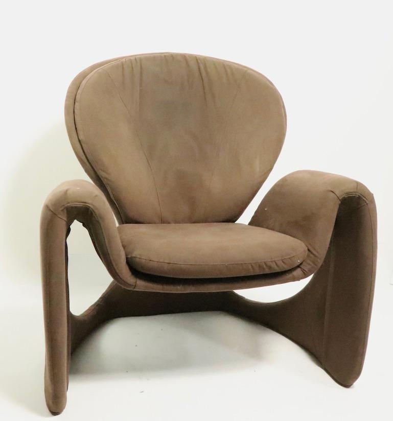 Wonderful sculptural lounge, club, armchair in the style of Pierre Paulin, probably Italian, circa 1980s. This example is in clean, original and untouched condition, showing only light cosmetic wear, normal and consistent with age. Upholstered in