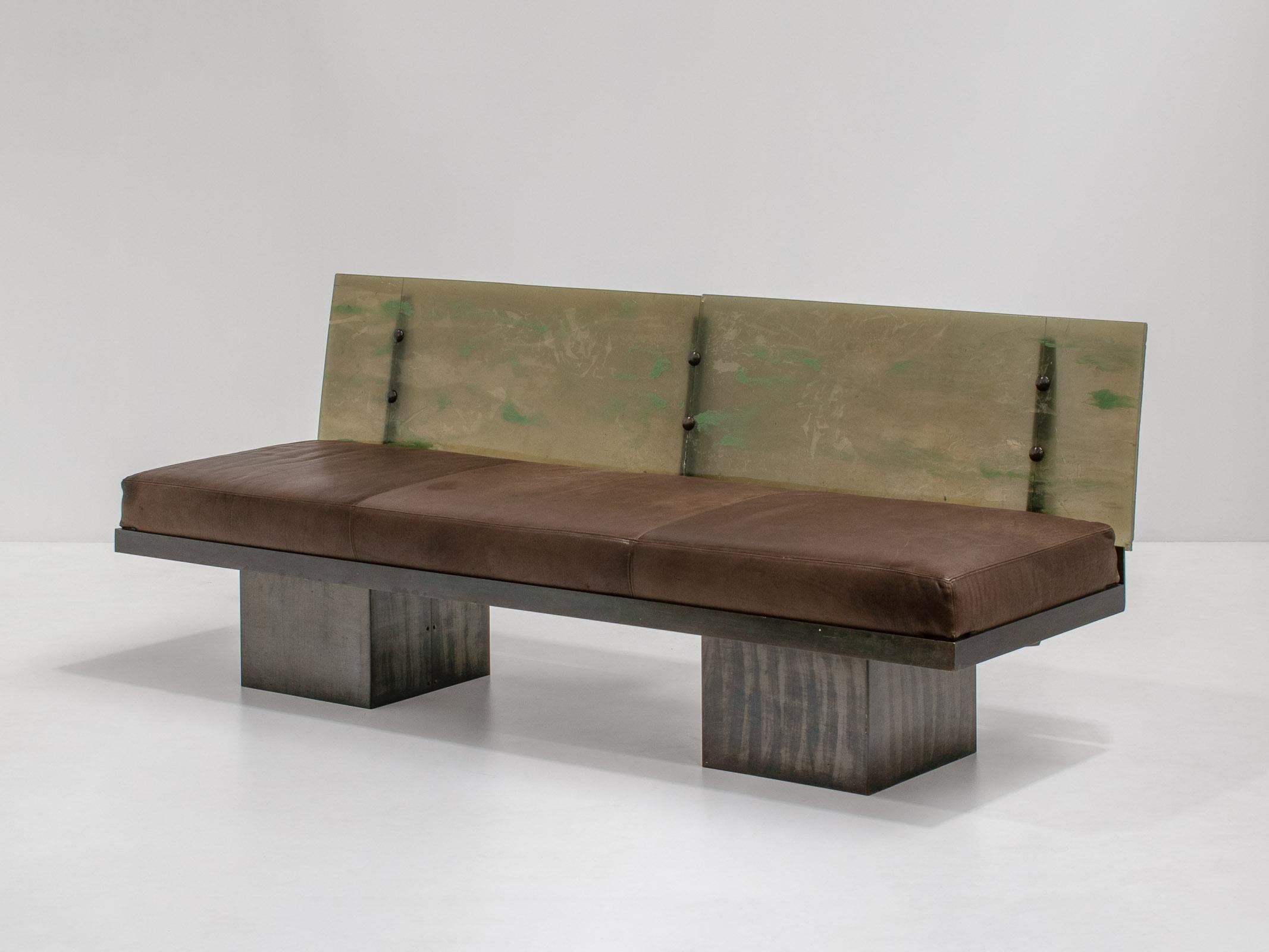 Very unique and unusual sofa. Inspired by the Maria Pergay, Michel Boyer era. Sourced in the south of France. Postmodernism.

The bench is made of multiple materials, creating a beautiful composition. The base of the sofa is made of steel and has a