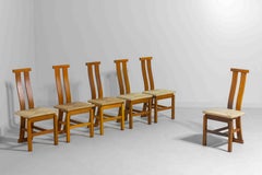 Sculptural postmodern dining chairs in wood with curved back, 1980s