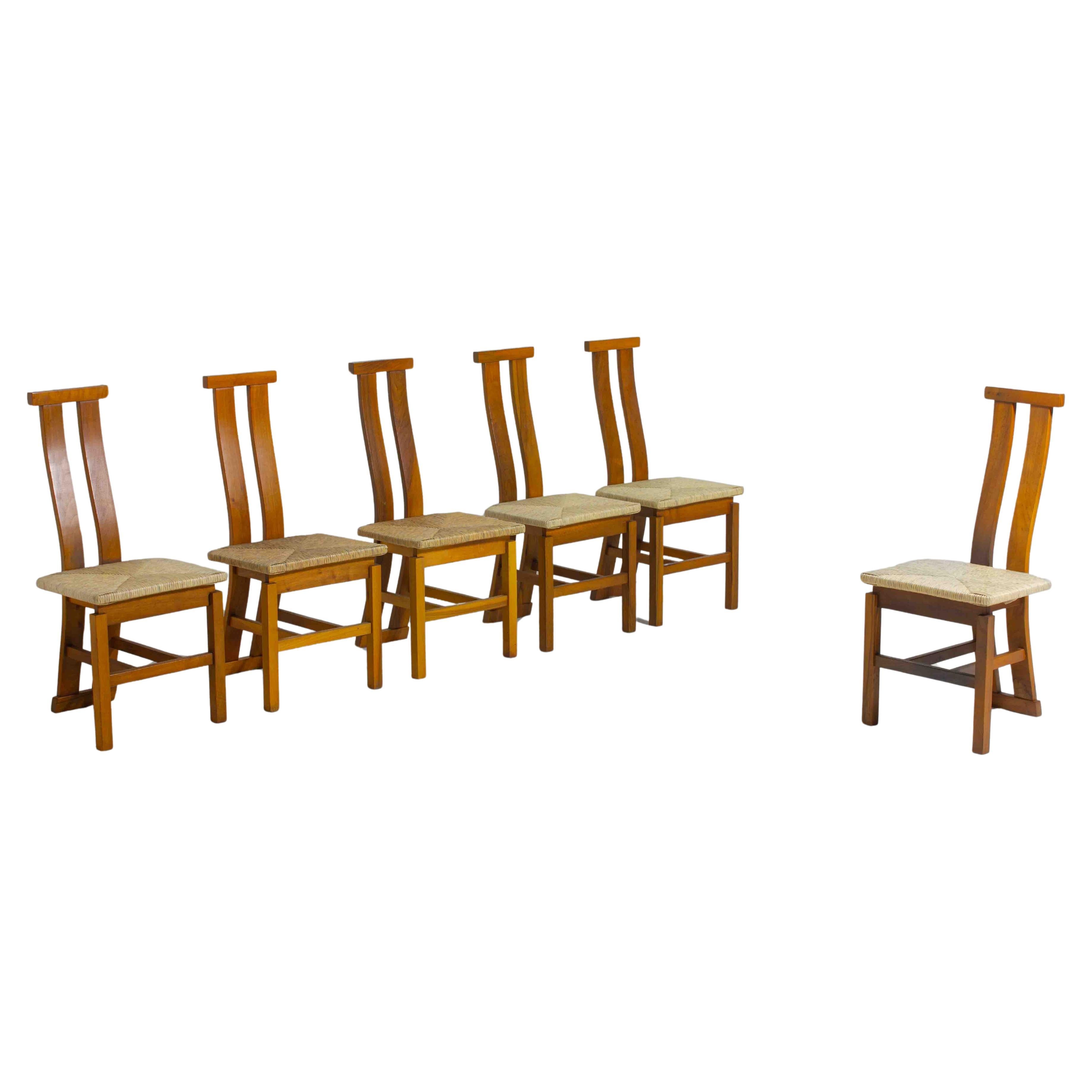 Sculptural postmodern dining chairs in wood with curved back, 1980s