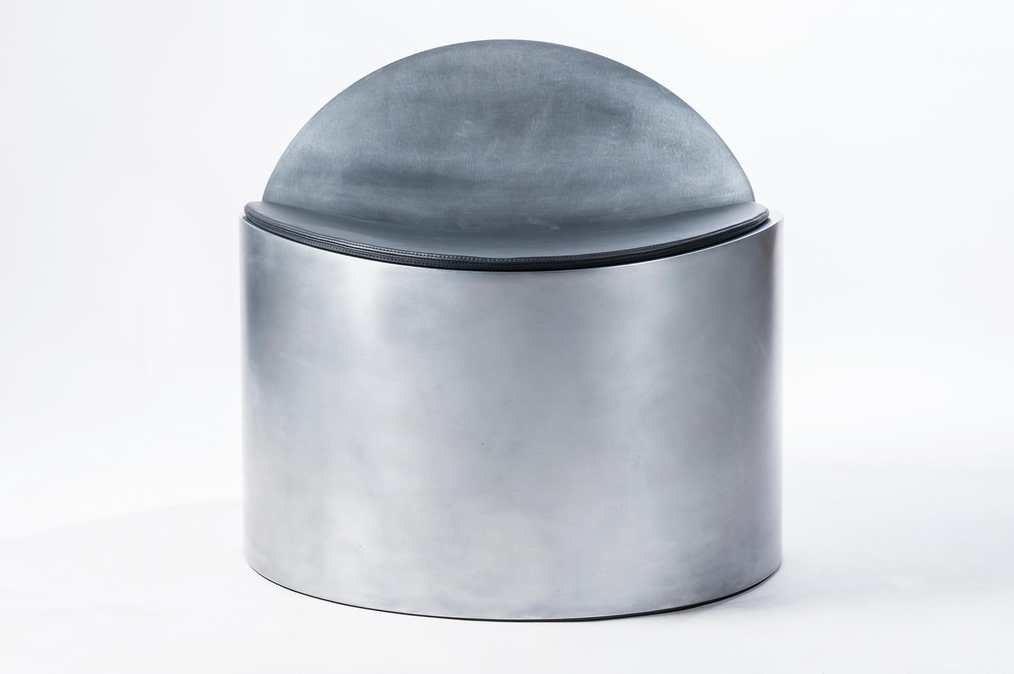 Polished Sculptural Rolled Chair by Jonathan Nesci in Rolled Aluminum with Leather Pad For Sale