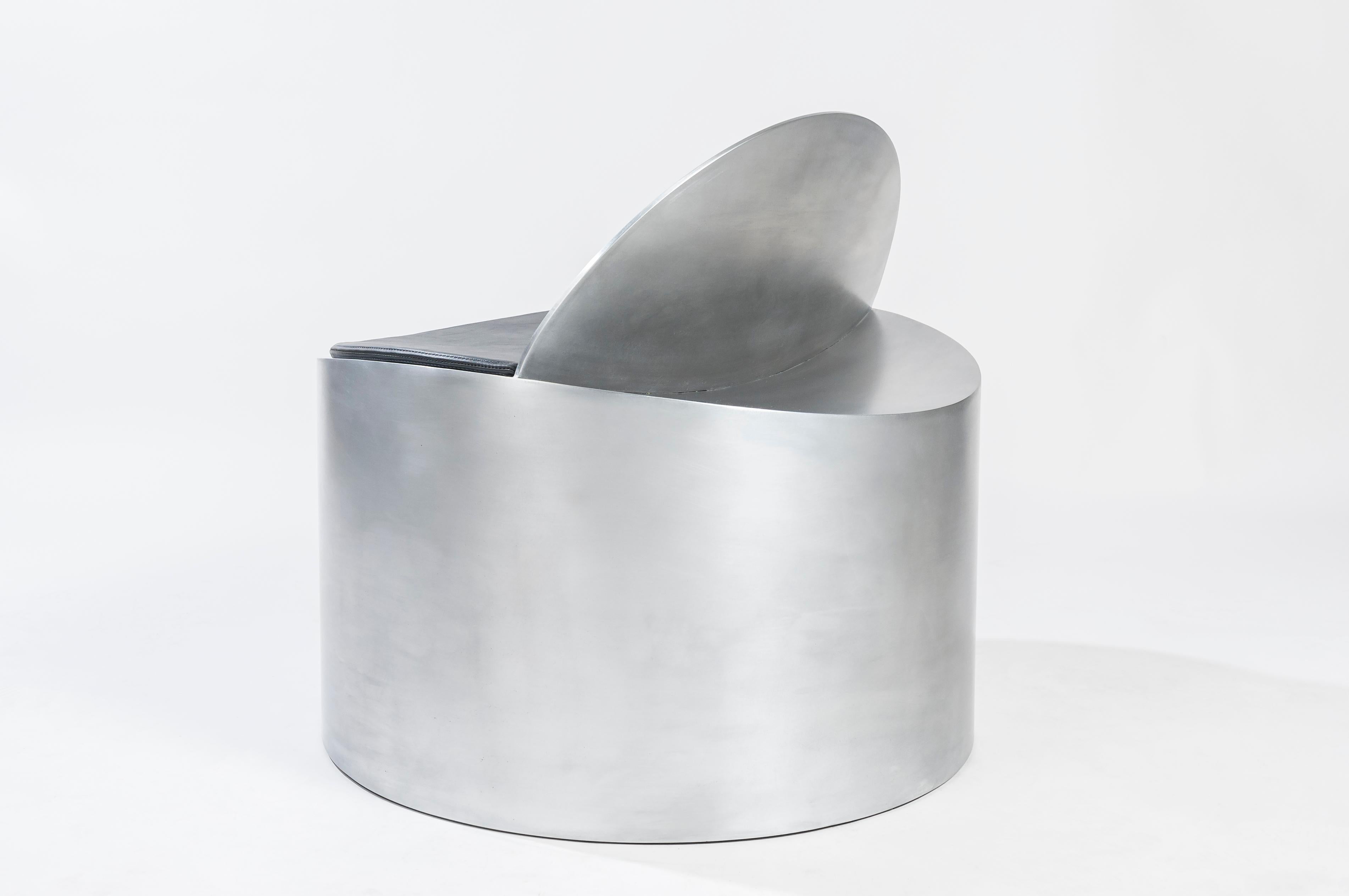 Contemporary Sculptural Rolled Chair by Jonathan Nesci in Rolled Aluminum with Leather Pad For Sale