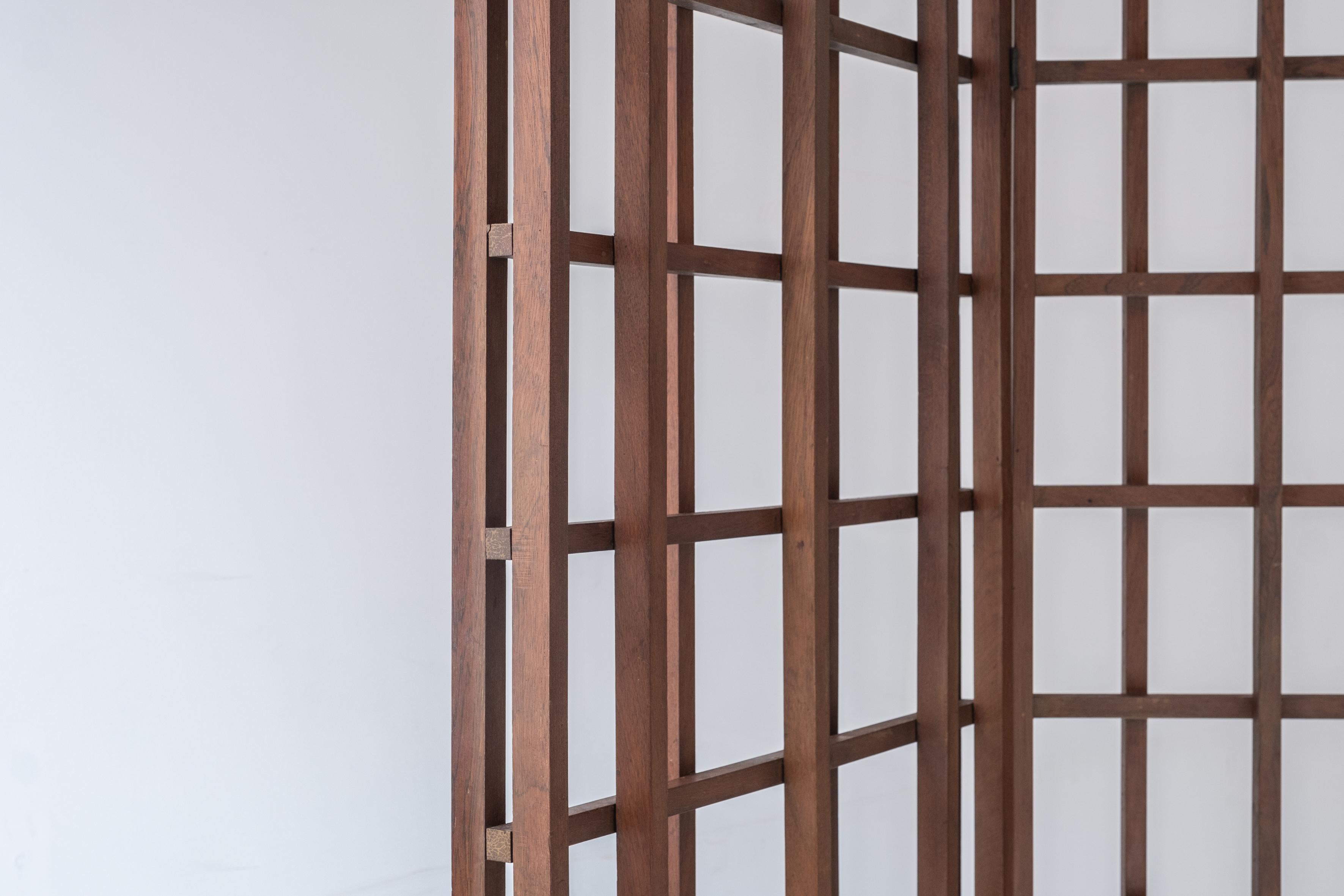 Teak Sculptural room divider designed and manufactured in Italy during the 1960s. For Sale