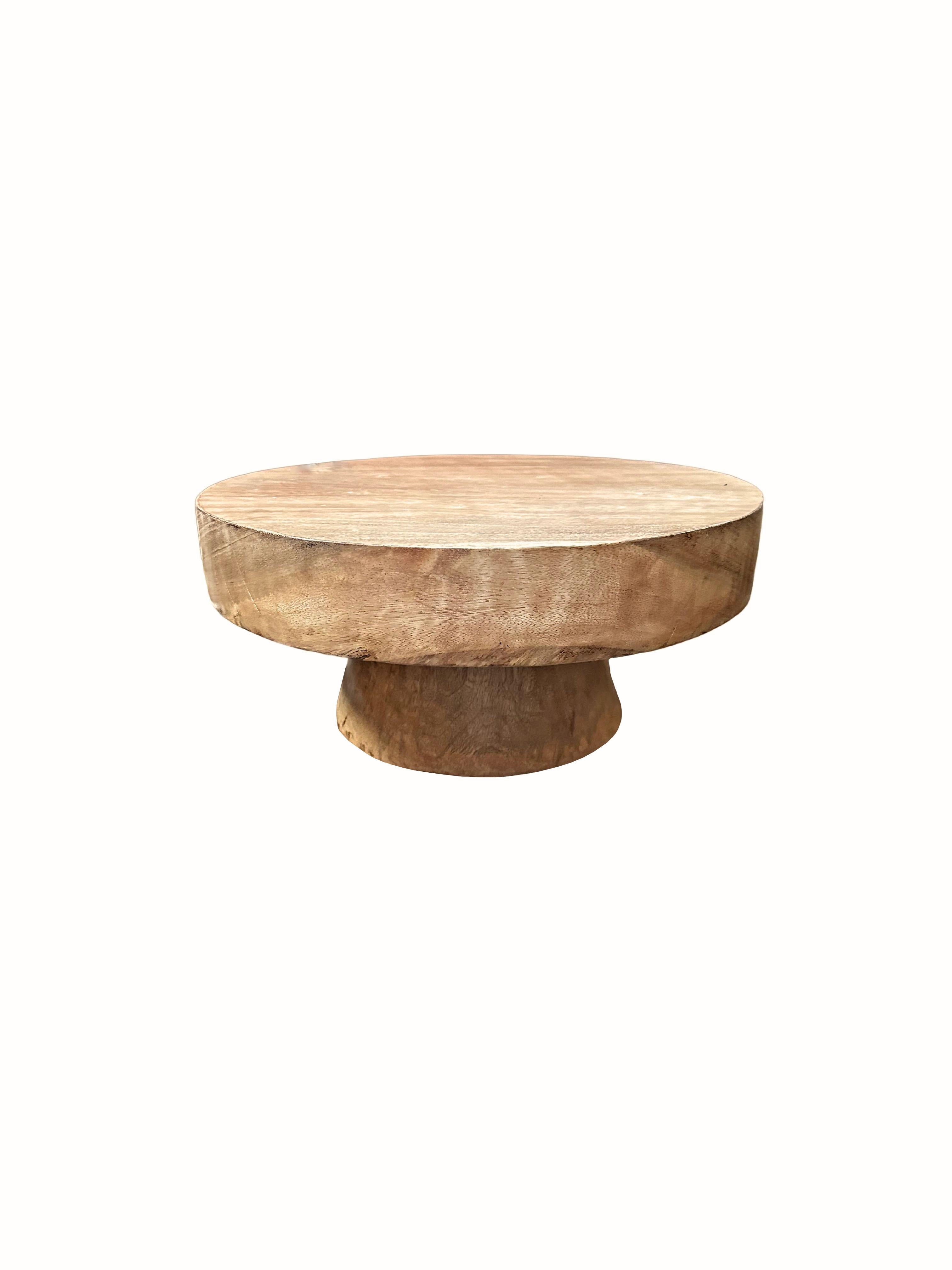 Hand-Crafted Sculptural Round Table Crafted from Solid Mango Wood, Natural Finish For Sale