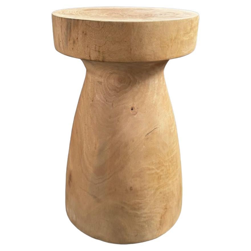 Sculptural Round Table Crafted from Solid Mango Wood, Natural Finish For Sale