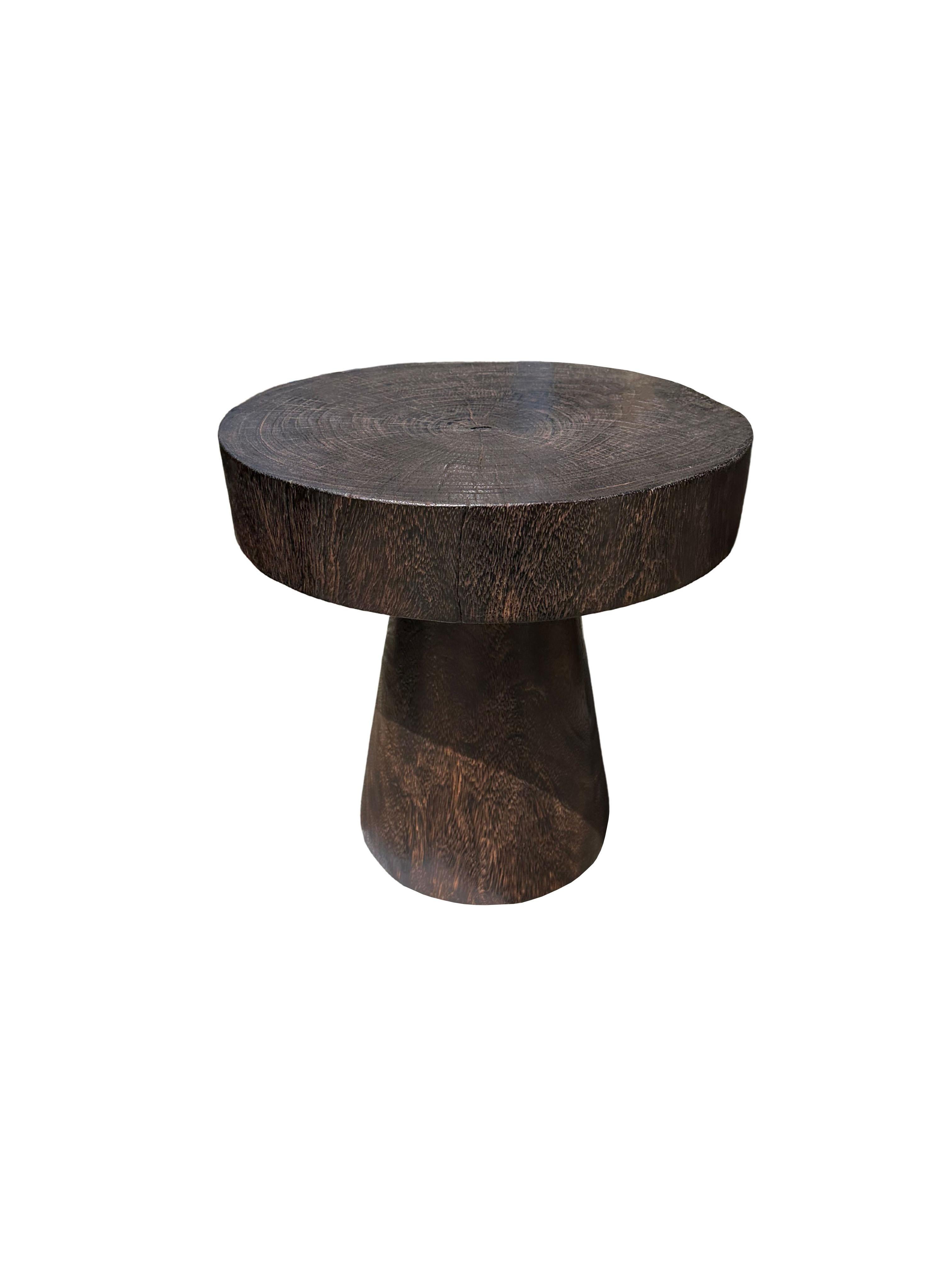 Indonesian Sculptural Round Table Crafted from Solid Suar Wood, Natural Finish For Sale