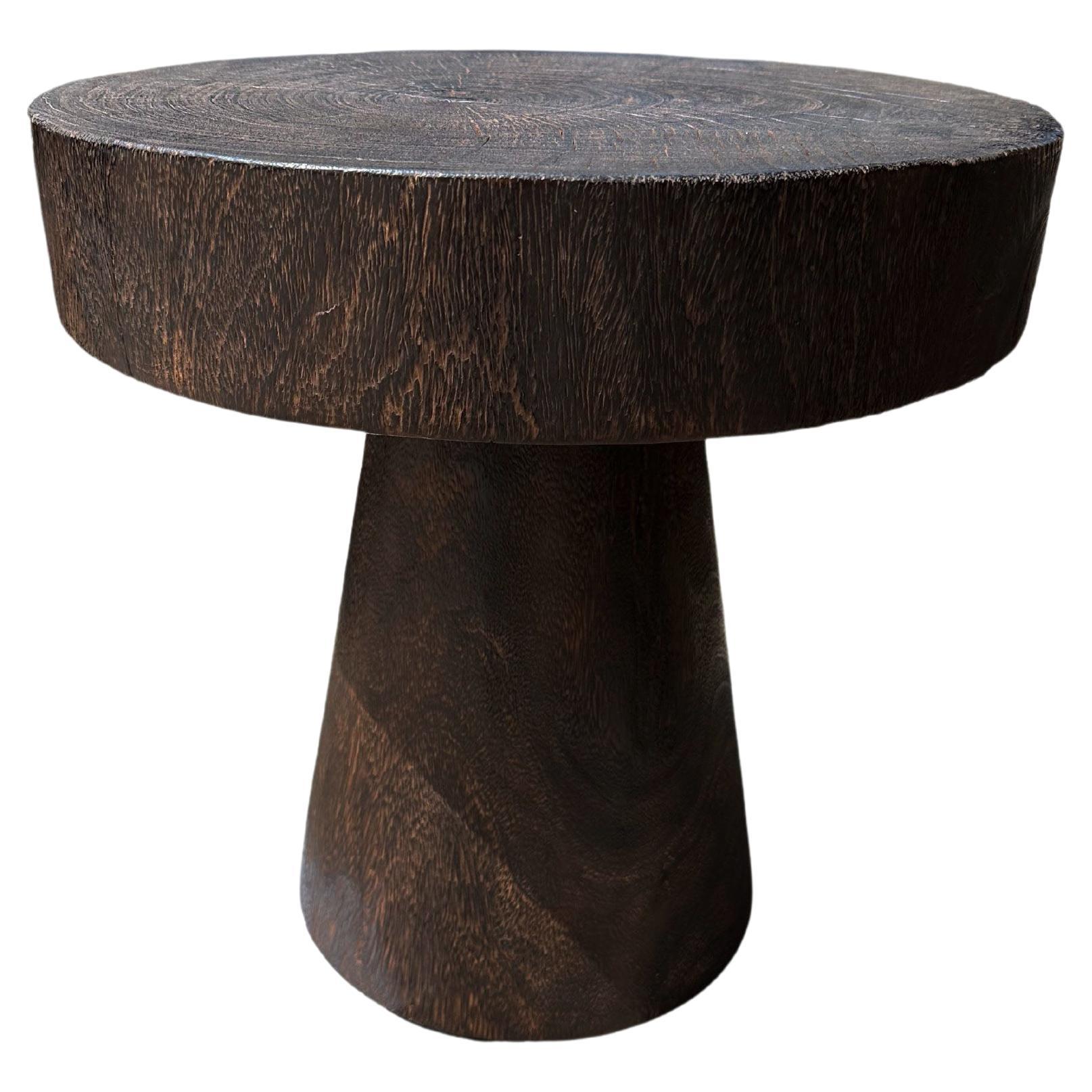 Sculptural Round Table Crafted from Solid Suar Wood, Natural Finish