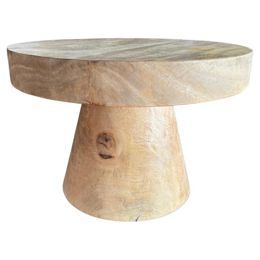 Sculptural Round Table Crafted from Solid Suar Wood, Natural Finish For Sale