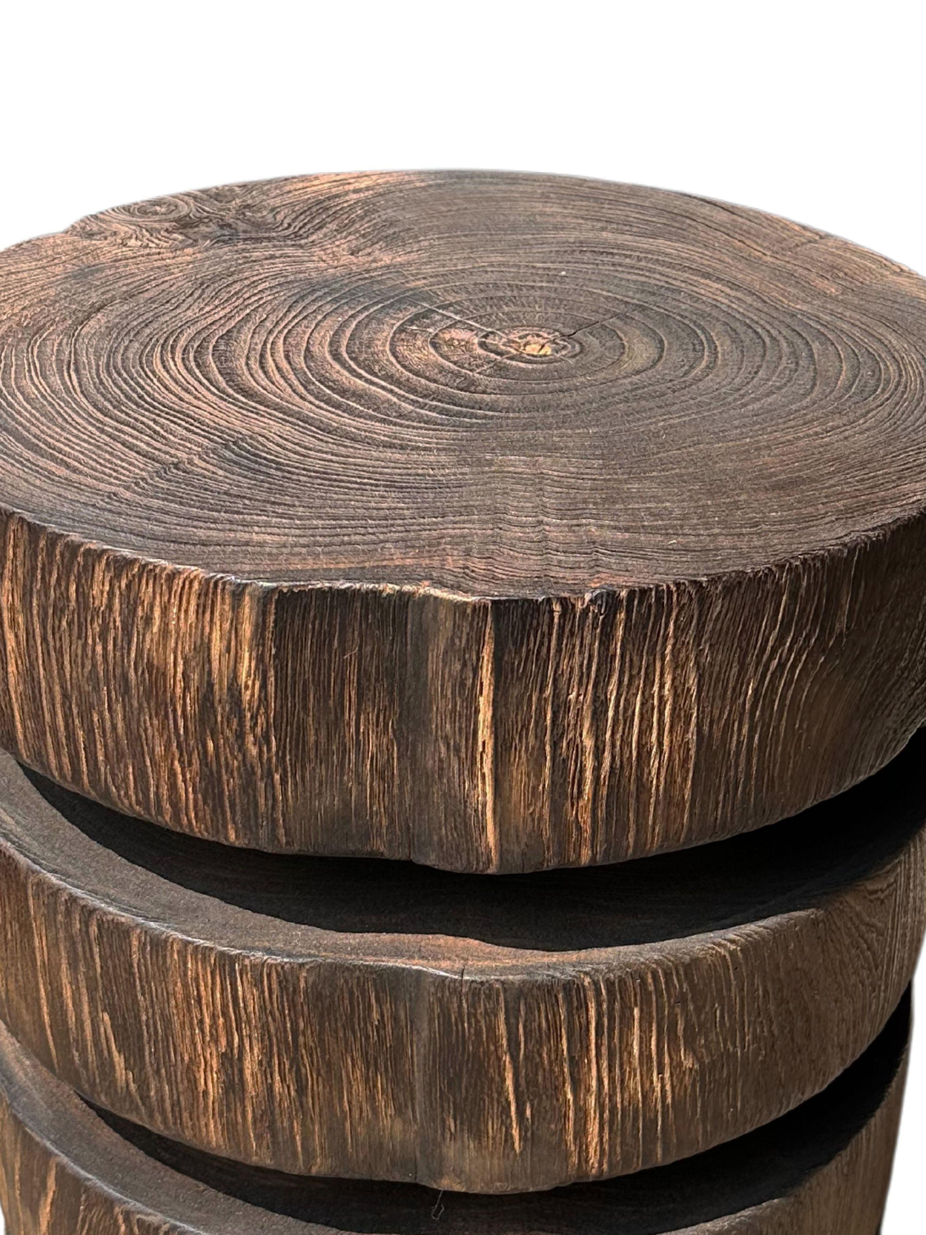 Indonesian Sculptural Round Table Crafted from Solid Suar Wood Stacked Design For Sale