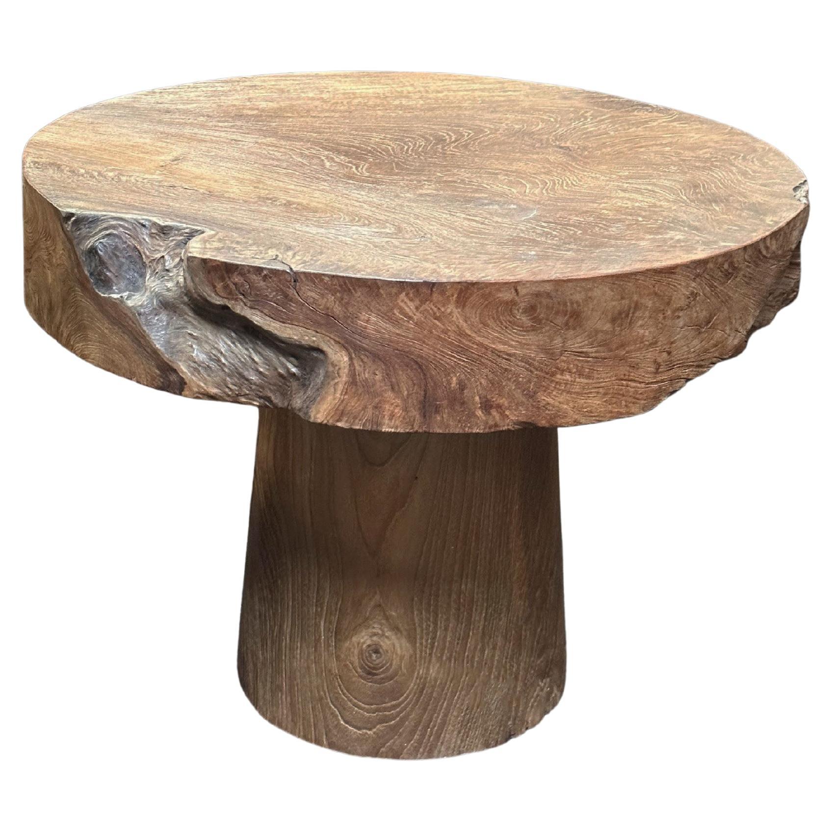 Sculptural Round Table Crafted from Teak Wood, Natural Finish For Sale