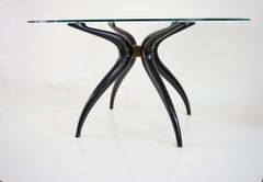 Sculptural round table, follower C. Mollino, lacquered wood brass glass, 1945