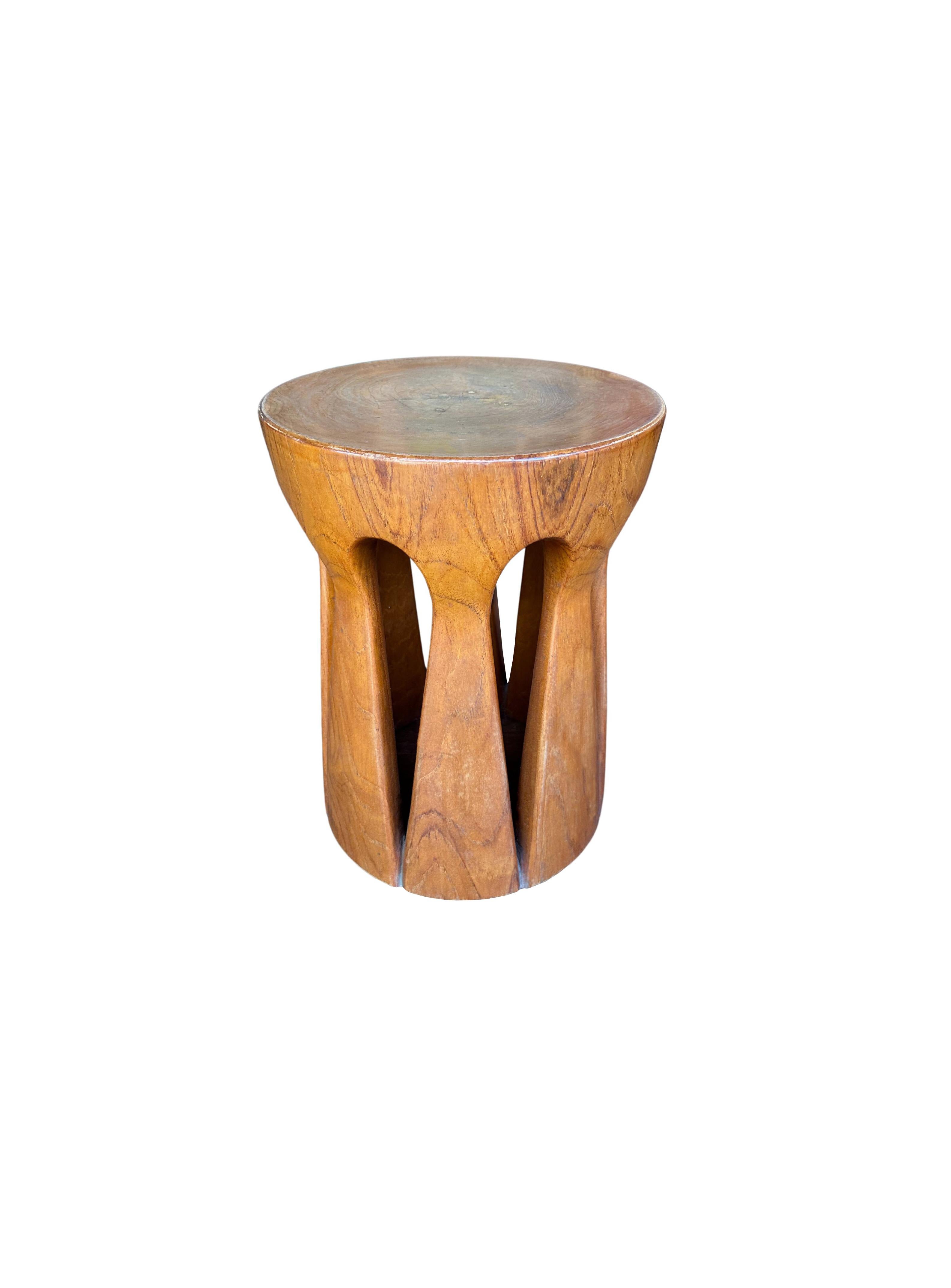 round teak stool
