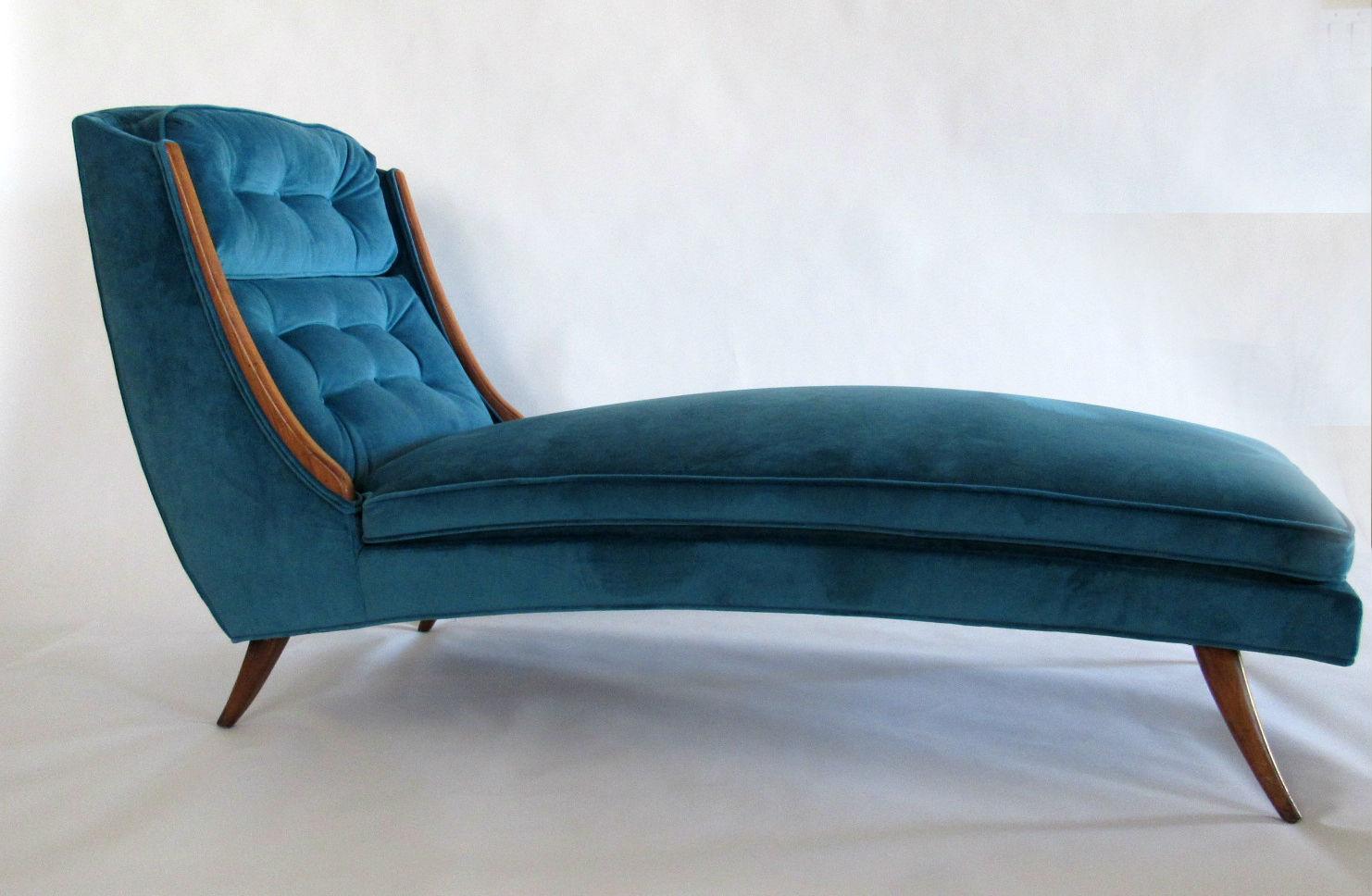 Sculptural Sabre Leg Chaise Chaise in Peacock Blue velvet, circa 1950s.  In the style of T.H. Robsjohn-Gibbings. 