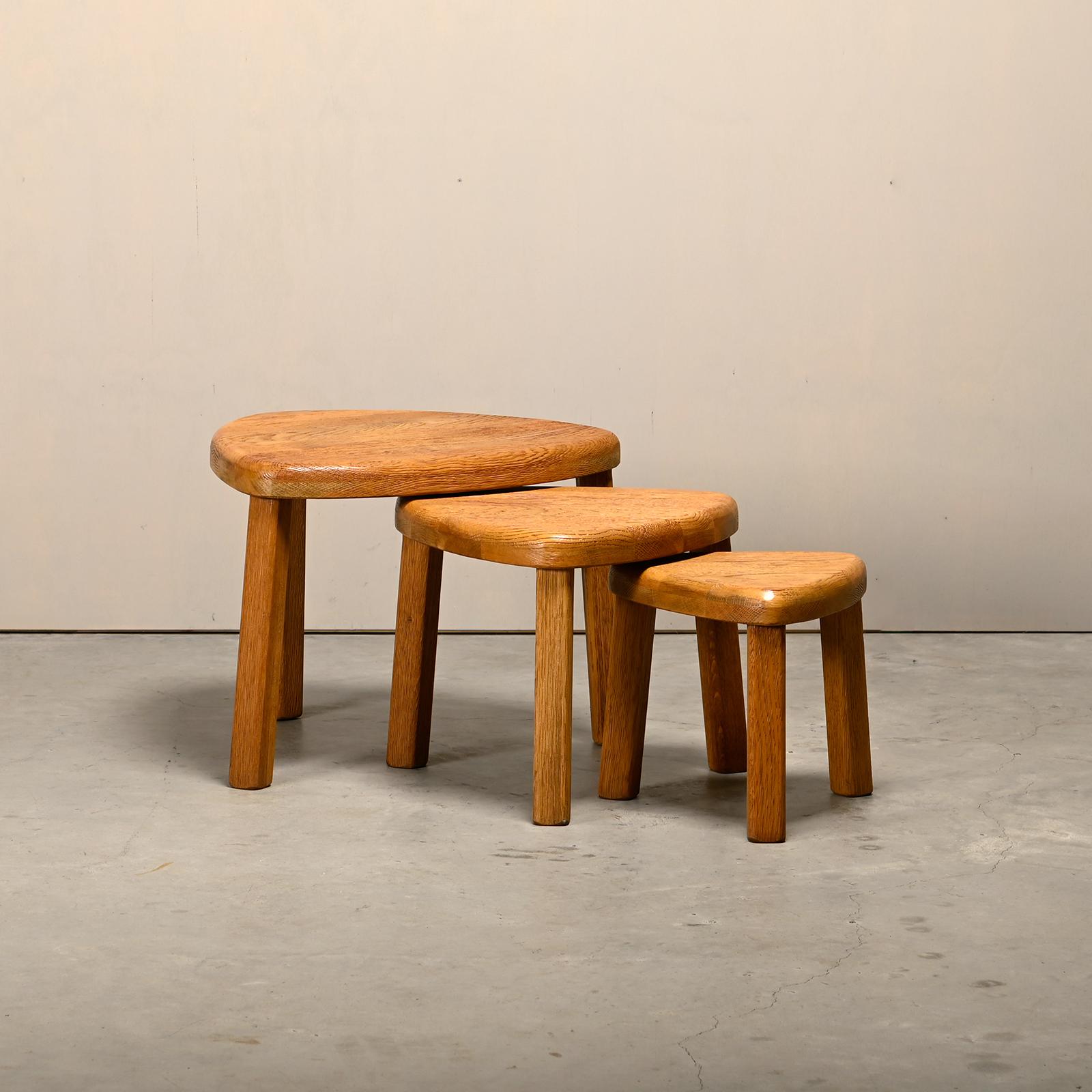 Sculptural set of side tables in solid oak, France, 1970s. The design of the tables is related to the designs of Piere Chapo. Good original condition with light traces of use.
