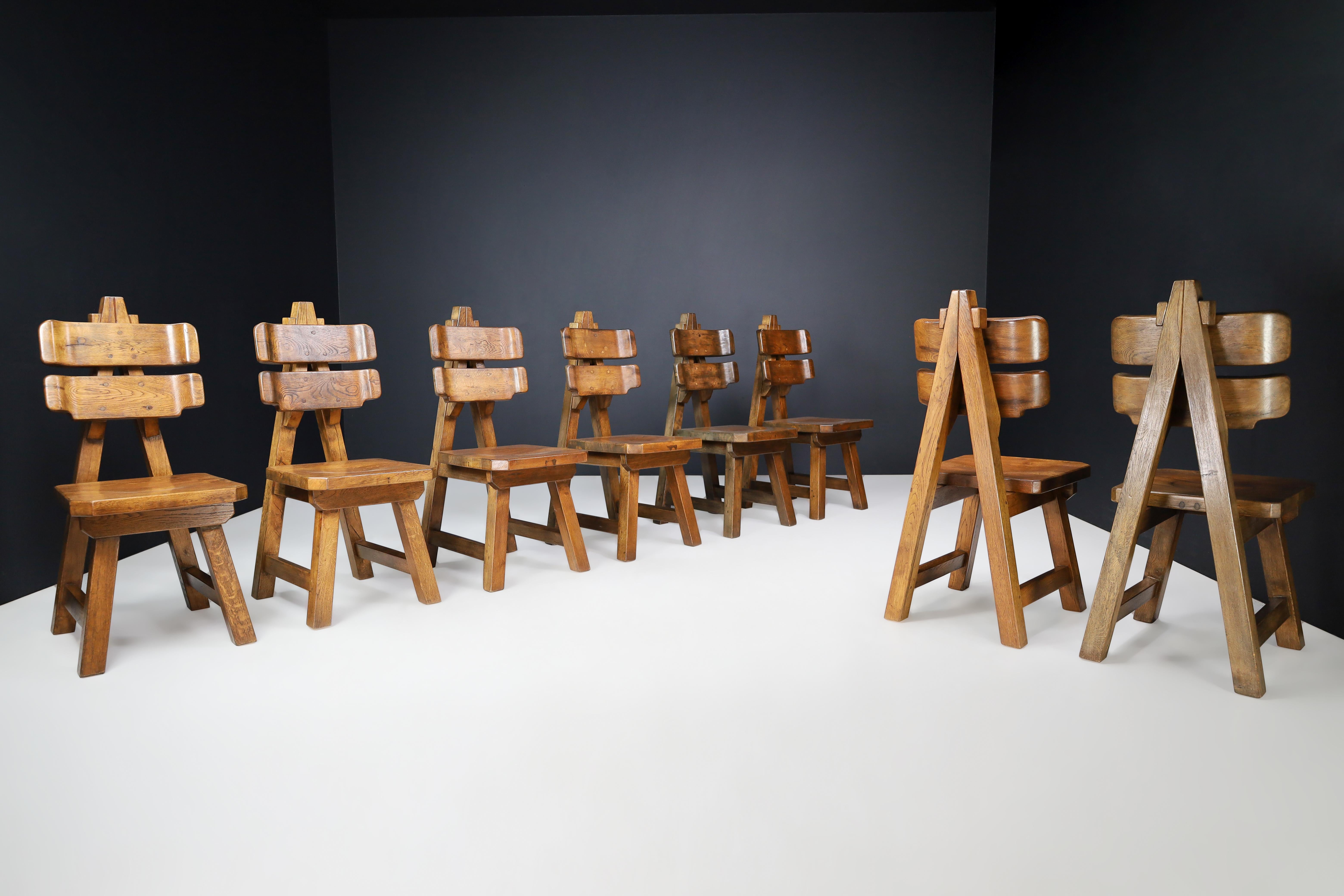 French Sculptural Set of Eight Brutalist Dining Chairs in Solid Oak, France, 1960s   For Sale