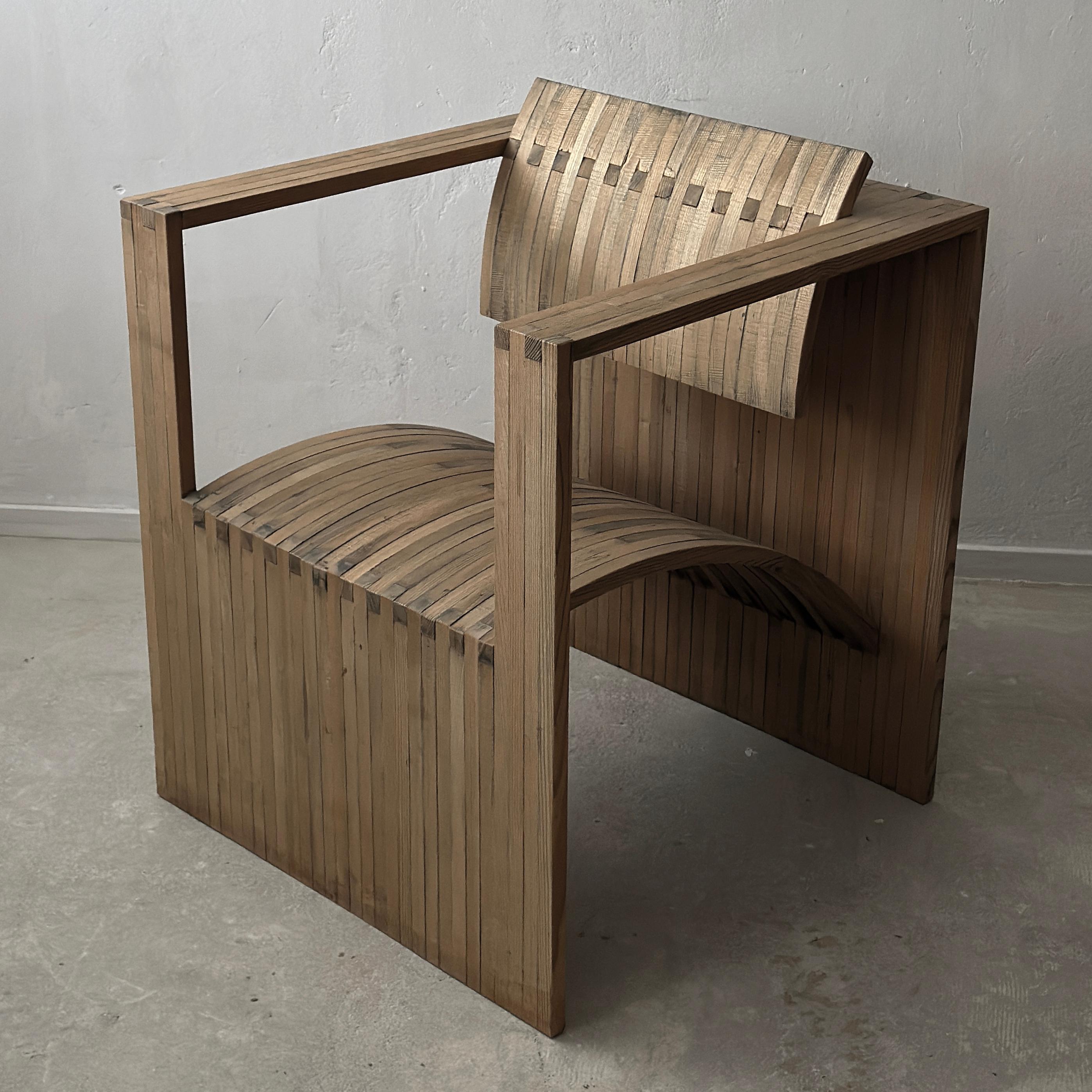 Introducing an exclusive chair that redefines elegance and craftsmanship. This unique piece seamlessly blends modern minimalism with artisanal woodwork, creating a bold, architectural form that’s both striking and functional. Each curve and angle