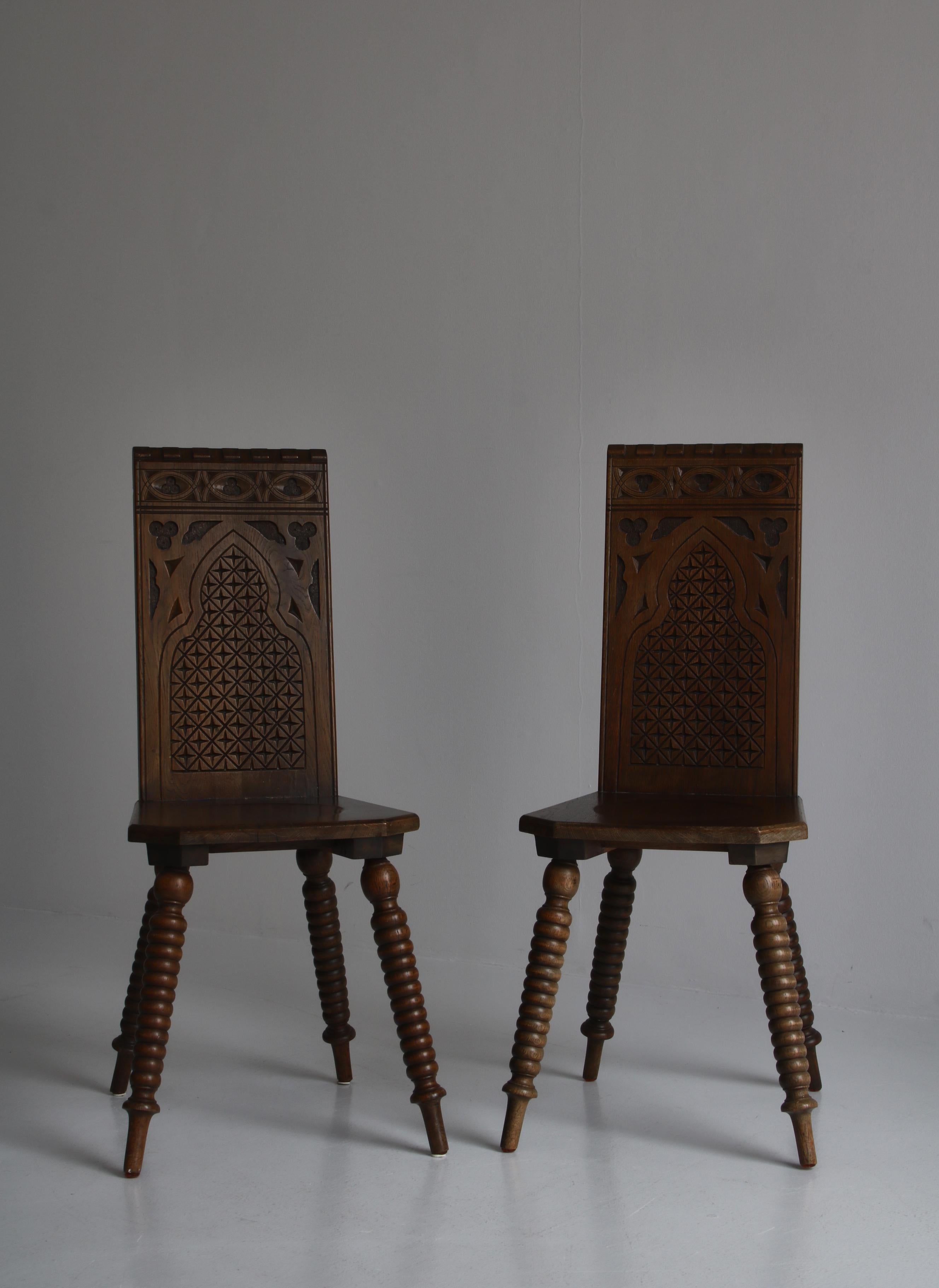 Early 20th Century Sculptural Side Chairs in Carved Dark Stained Oak by Scandinavian Cabinetmaker For Sale