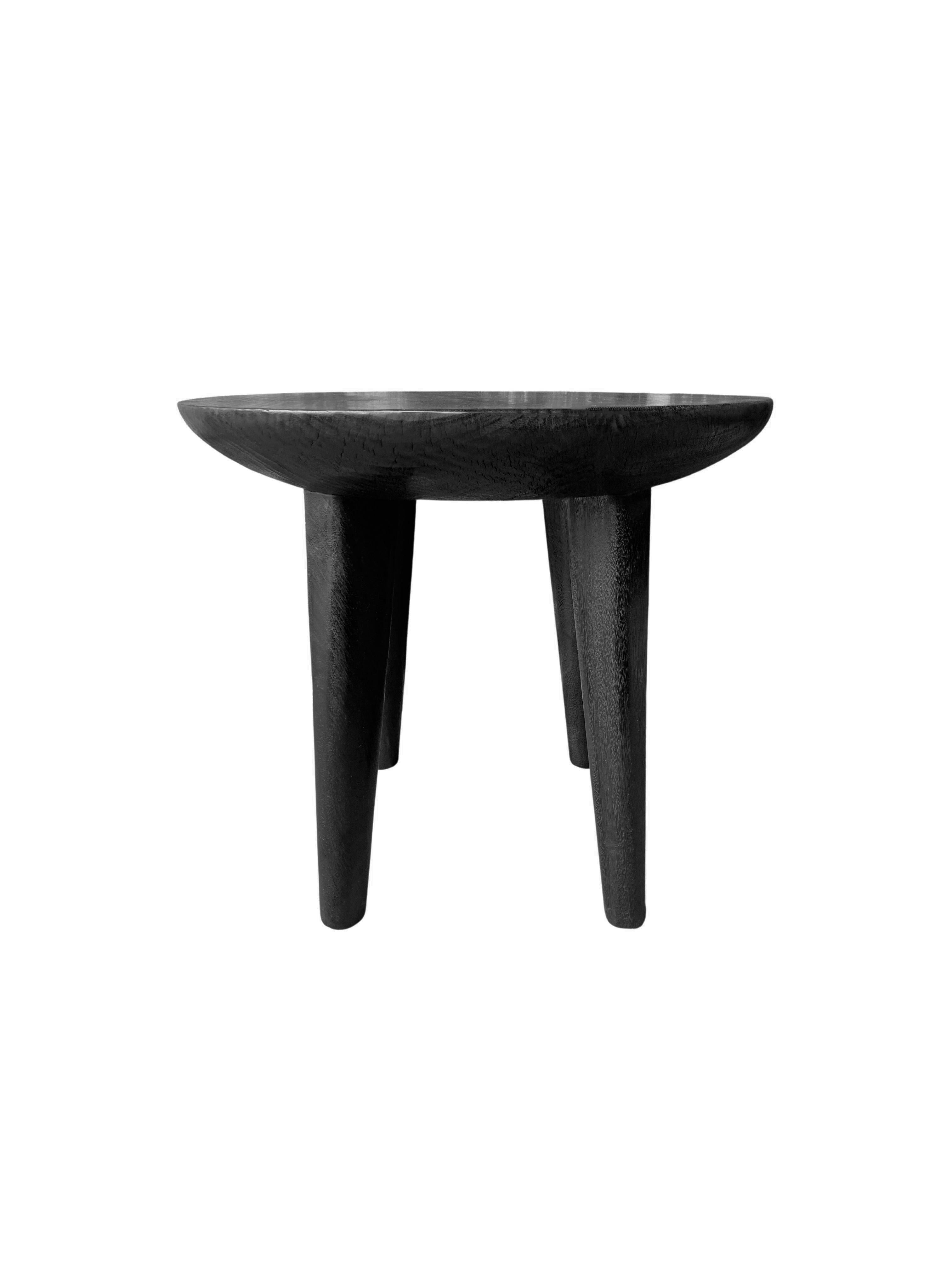 black sculptural side table