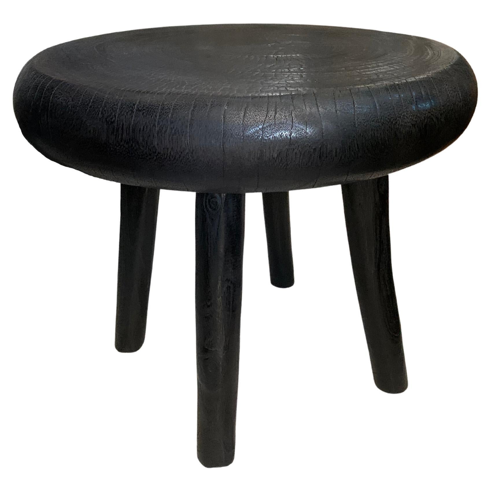 Sculptural Side Table Crafted from Mango Wood & Burnt, Black Finish For Sale