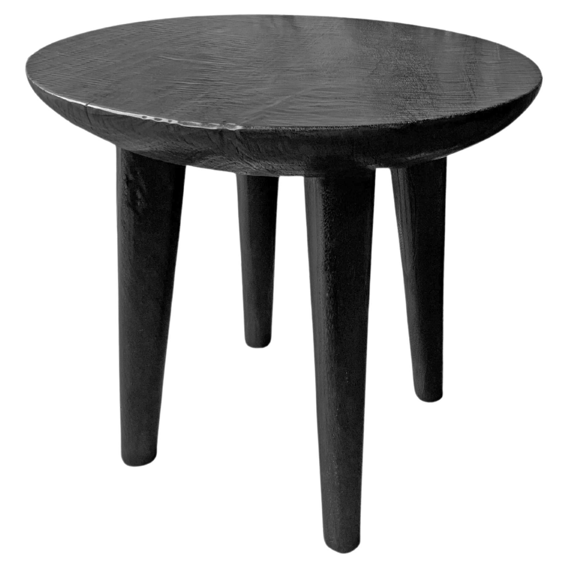 Sculptural Side Table Crafted from Mango Wood & Burnt, Black Finish For Sale