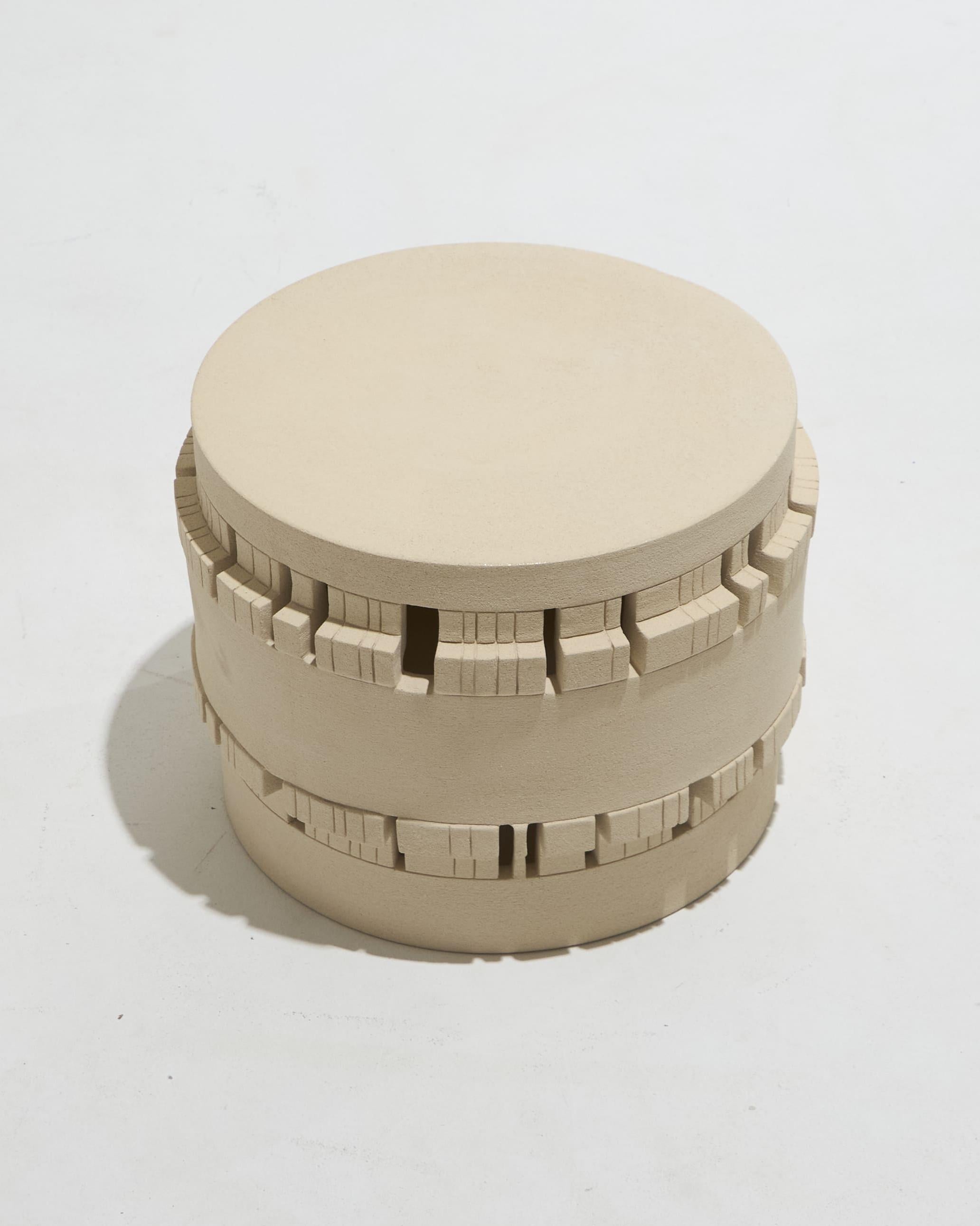 Sculptural side table in chamotte stoneware by Marjorie Waks.

Boldly graphic and decidedly abstract, Marjorie Waks' ceramics evoke a multitude of imaginative worlds.