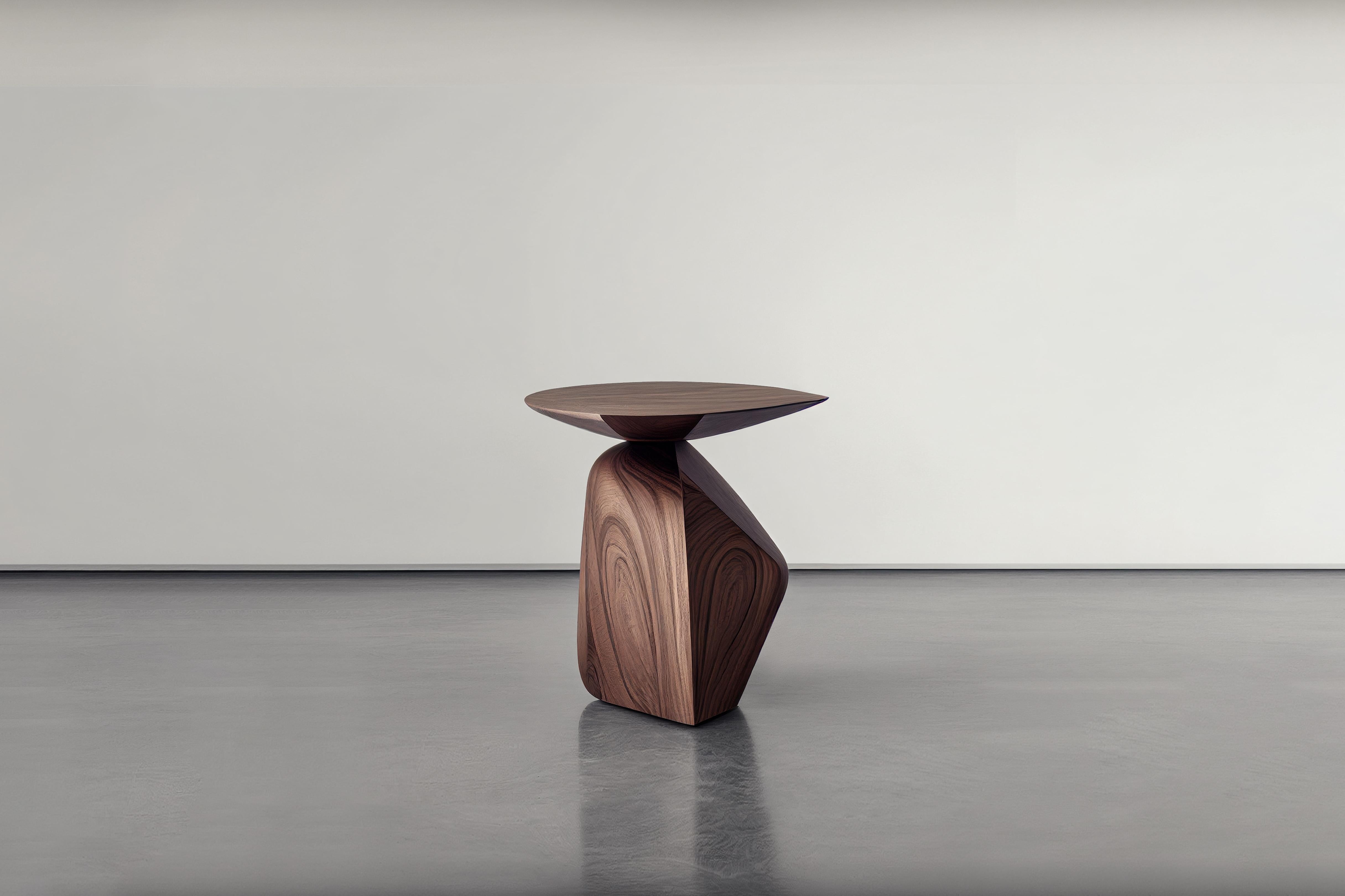Sculptural side table made of solid walnut wood, nightstand, auxiliary table solace S1 by Joel Escalona

The solace side table series, designed by Joel Escalona, is a furniture collection that exudes balance and presence, thanks to its sensuous,