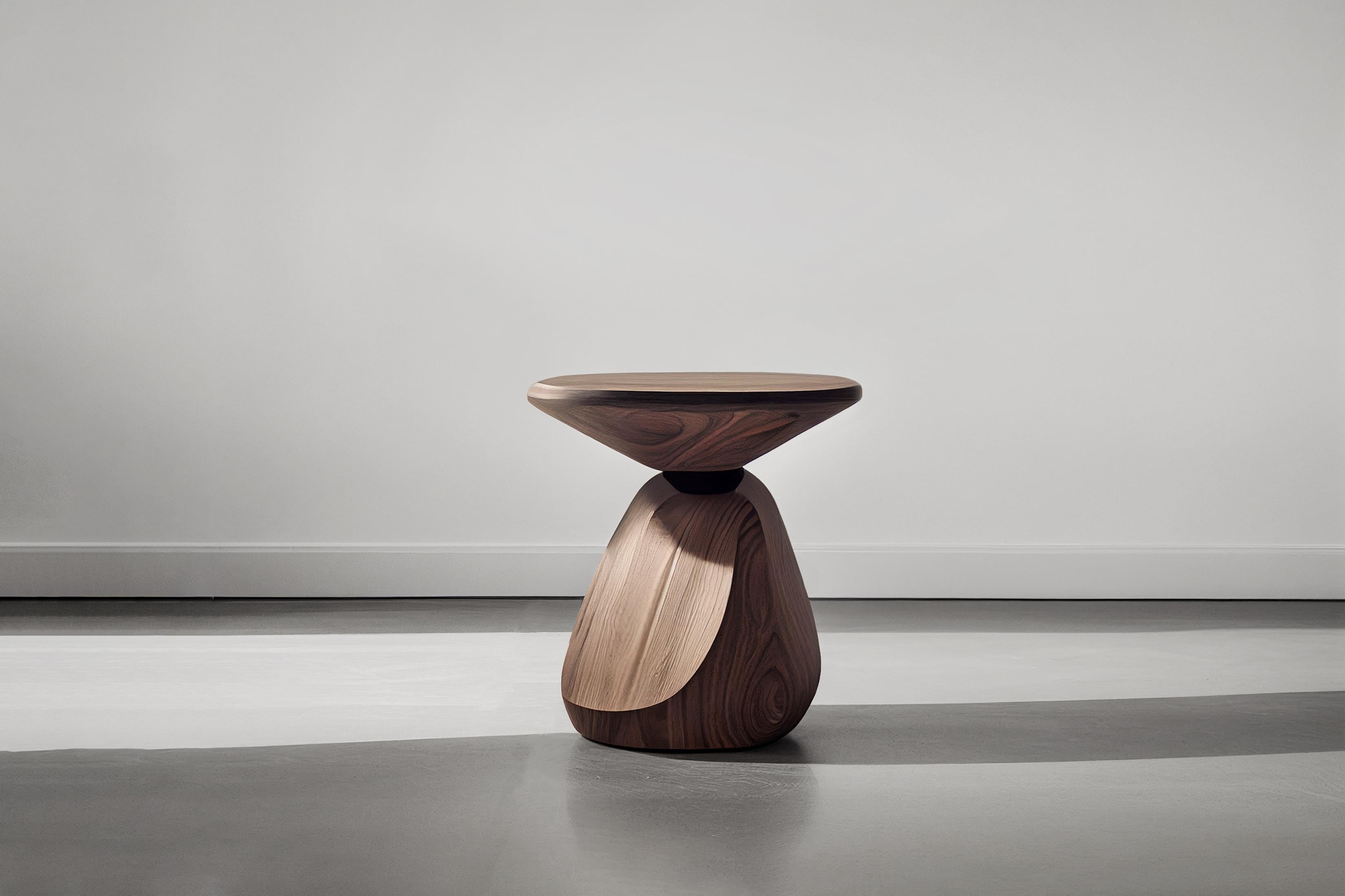 Sculptural side table made of solid walnut wood, nightstand, auxiliary table solace S4 by Joel Escalona

The Solace side table series, designed by Joel Escalona, is a furniture collection that exudes balance and presence, thanks to its sensuous,