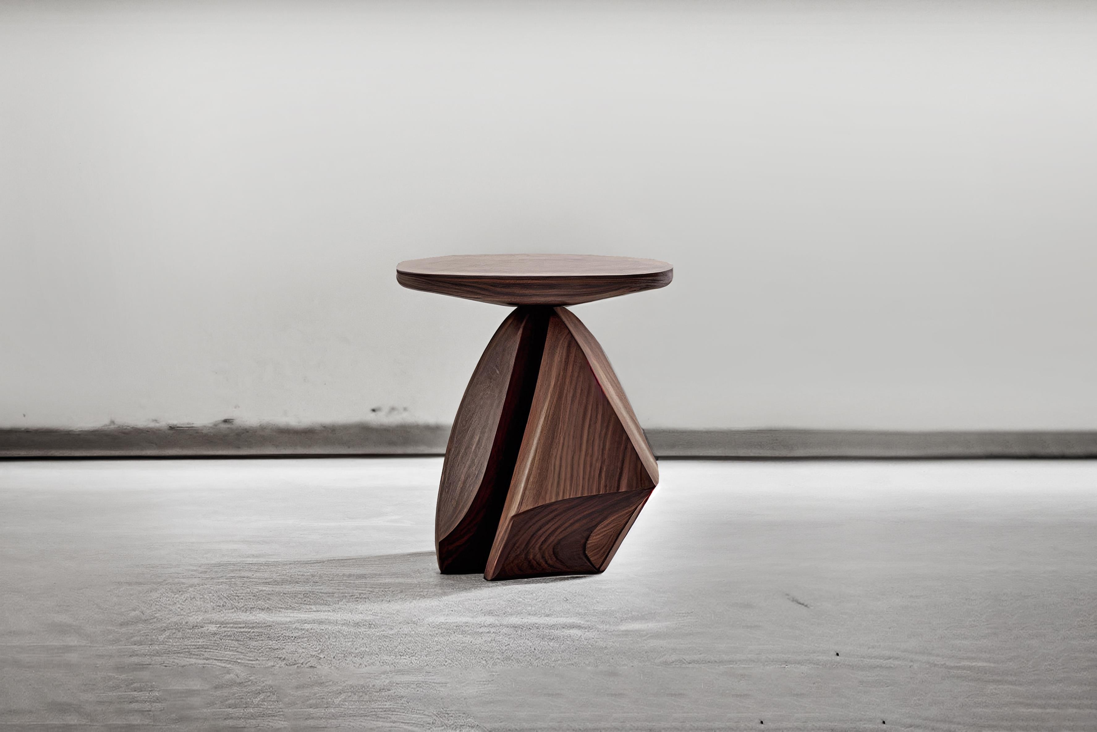 Sculptural side table made of solid walnut wood, nightstand, auxiliary table solace S6 by Joel Escalona

The Solace side table series, designed by Joel Escalona, is a furniture collection that exudes balance and presence, thanks to its sensuous,