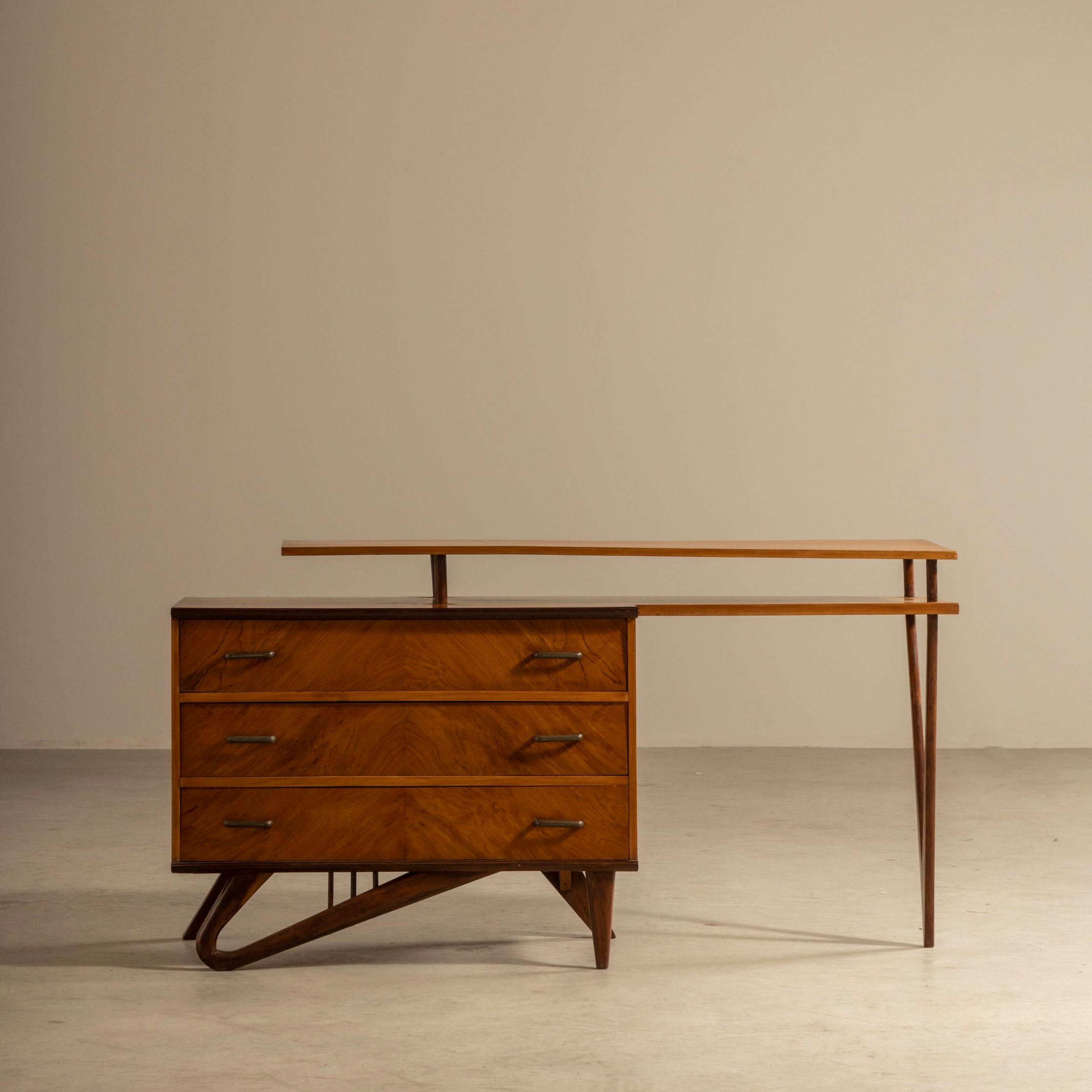 Giuseppe Scapinelli was a Brazilian designer born in Italy in 1908. He was recognized for his unique and innovative designs, which incorporated both traditional and modern elements. One of his notable designs is a small sideboard made in caviuna