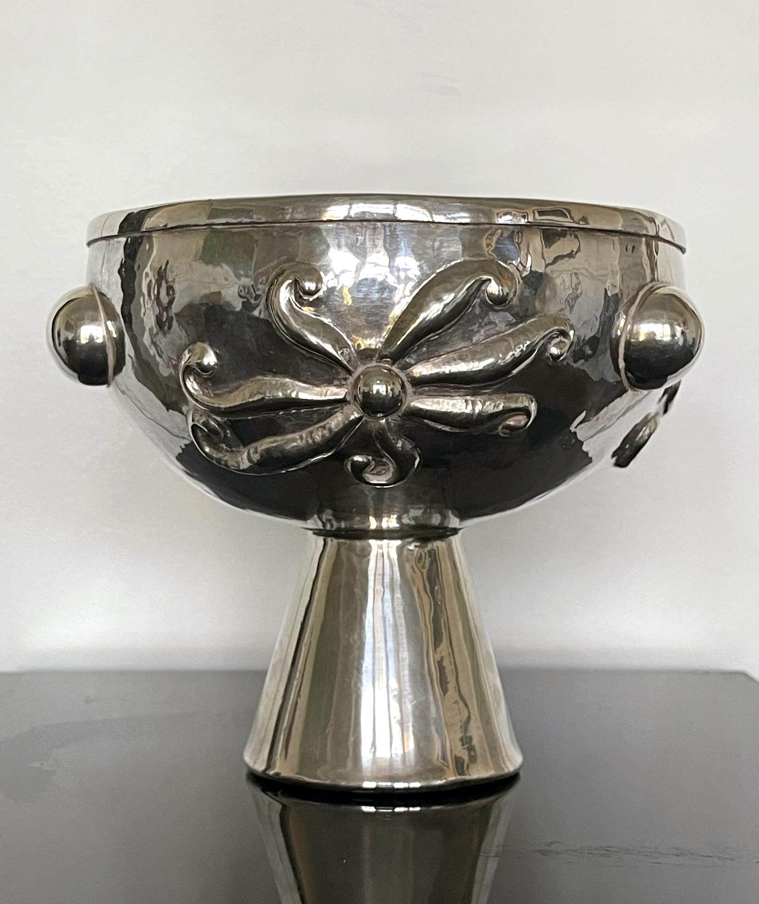 A stunning sterling silver vessel in the form of a stemmed bowl crafted by Graziella Laffi, Lima, Peru, Circa 1965. Marked on the rim: G. Laffi, PERU. The vessel was designed as a modern rendition of ancient pre-Columbina drinking vessel used in